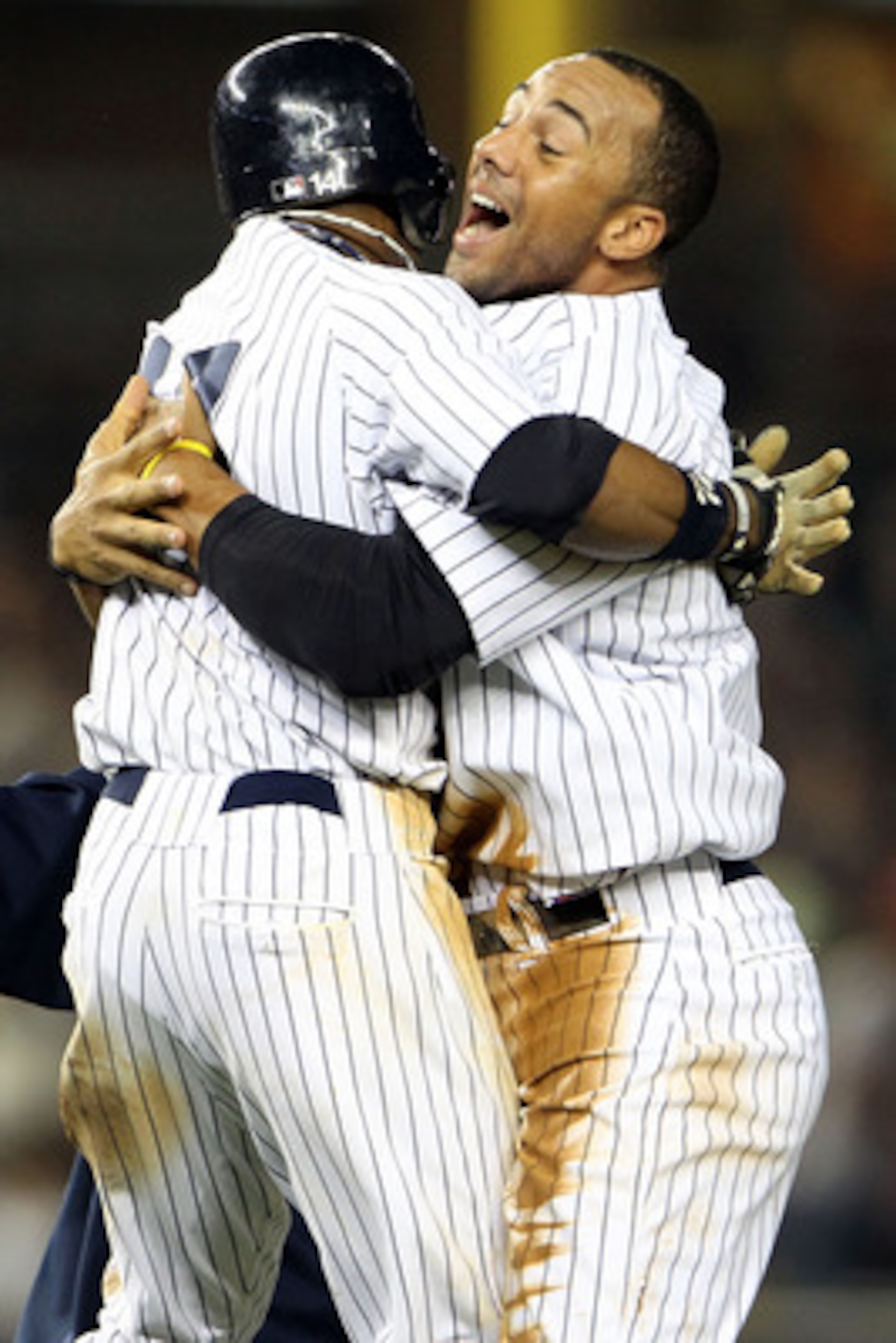 NEW YORK, NY - MAY 24:  Brett Gardner #11 and Chris Dickerson #27 of the New York Yankees celebrate after defeating the Toronto Blue Jays at Yankee Stadium on May 24, 2011 in the Bronx borough of New York City.  (Photo by Michael Heiman/Getty Images)