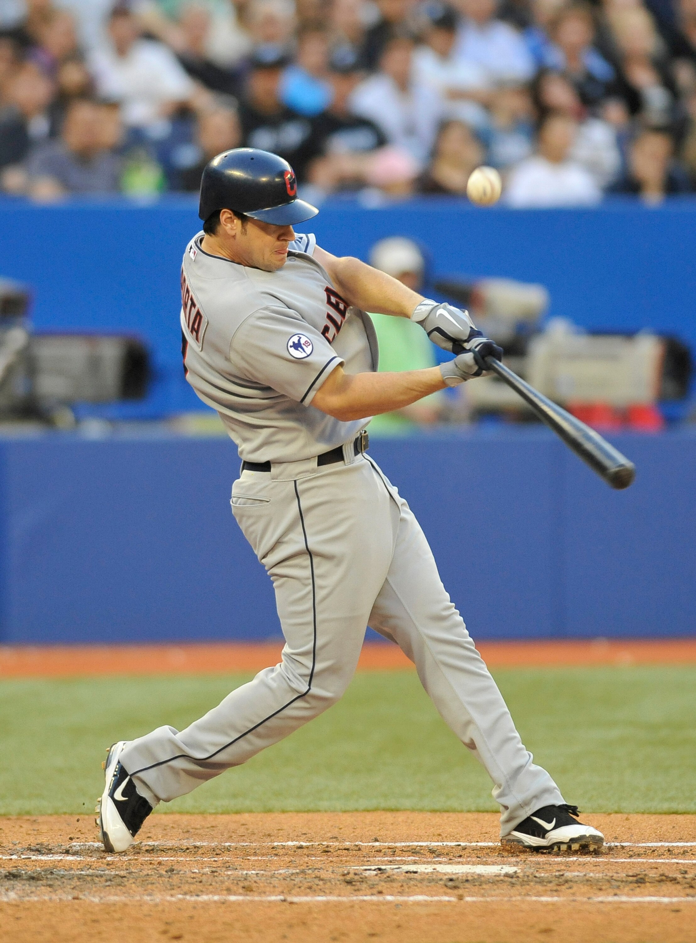 TORONTO, CANADA - JUNE 1:  Matt LaPorta #7 of the Cleveland Indians pops one up during game action against the Toronto Blue Jays June 1, 2011 at Rogers Centre in Toronto, Ontario, Canada. (Photo by Brad White/Getty Images)