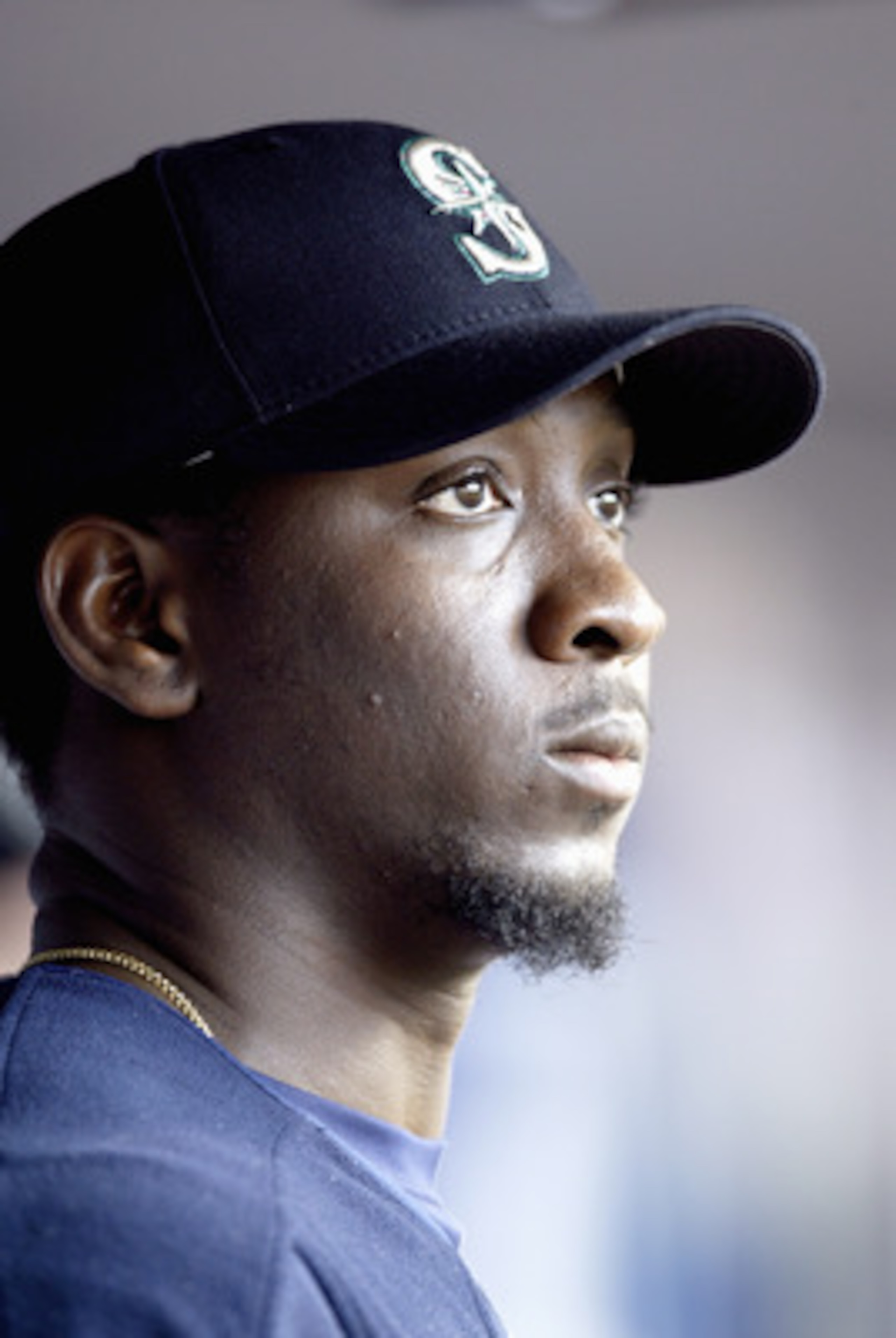 SEATTLE - JUNE 14:  Pokey Reese #3 of the Seattle Mariners watches from the dugout during the game with the Philadelphia Phillies on June 14 2005 at Safeco Field in Seattle Washington. The Mariners won 3-1. (Photo by Otto Greule Jr/Getty Images)