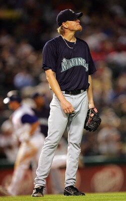 ARLINGTON, TX - AUGUST 23: Jeff Weaver #36 of the Seattle Mariners steps off the mound after Brad Wilkerson #6 of the Texas Rangers hit a two-run homerun on August 23, 2007 at Rangers Ballpark in Arlington, Texas.   (Photo by Ronald Martinez/Getty Images)