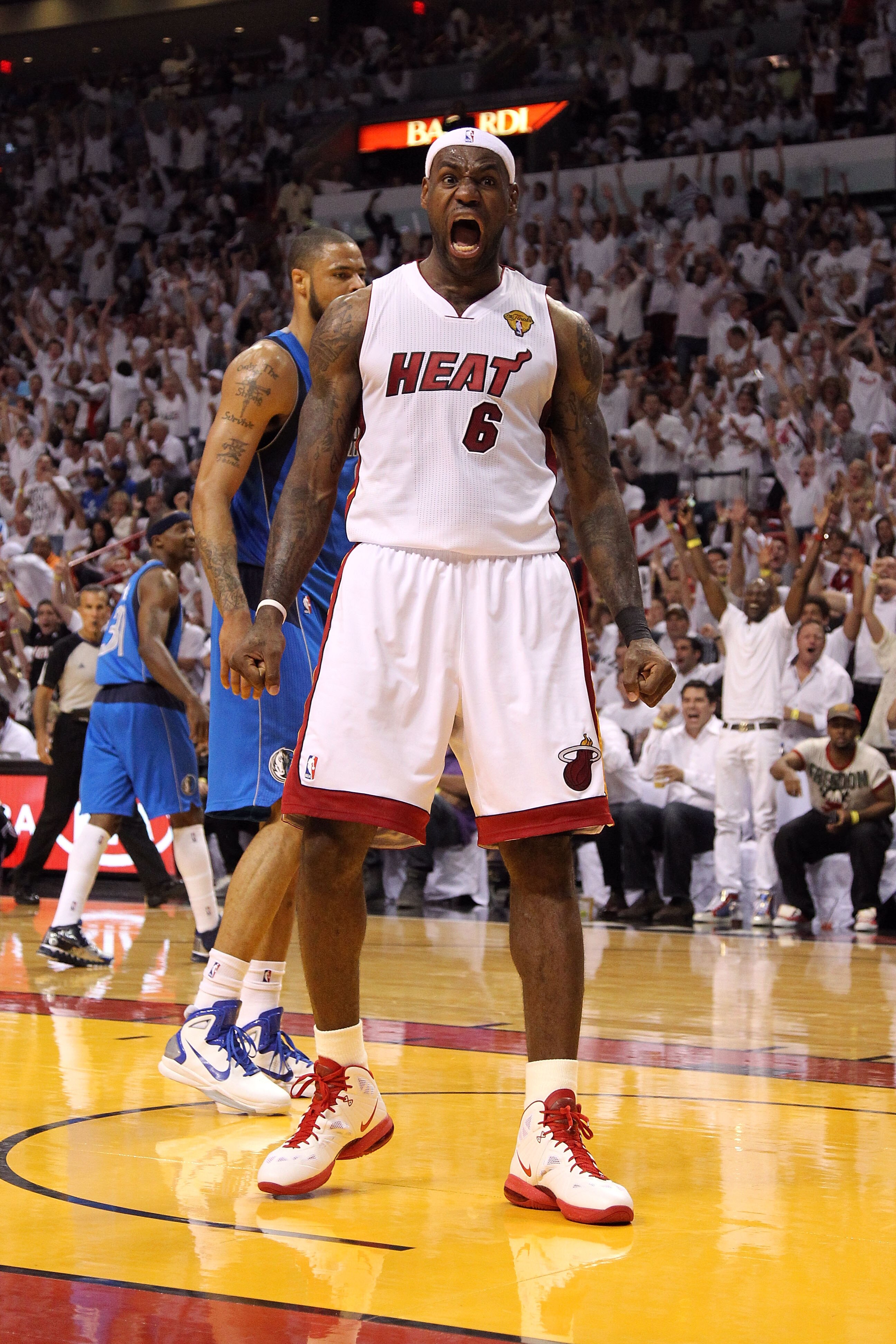 MIAMI, FL - JUNE 02:  LeBron James #6 of the Miami Heat reacts against the Dallas Mavericks in Game Two of the 2011 NBA Finals at American Airlines Arena on June 2, 2011 in Miami, Florida. NOTE TO USER: User expressly acknowledges and agrees that, by down