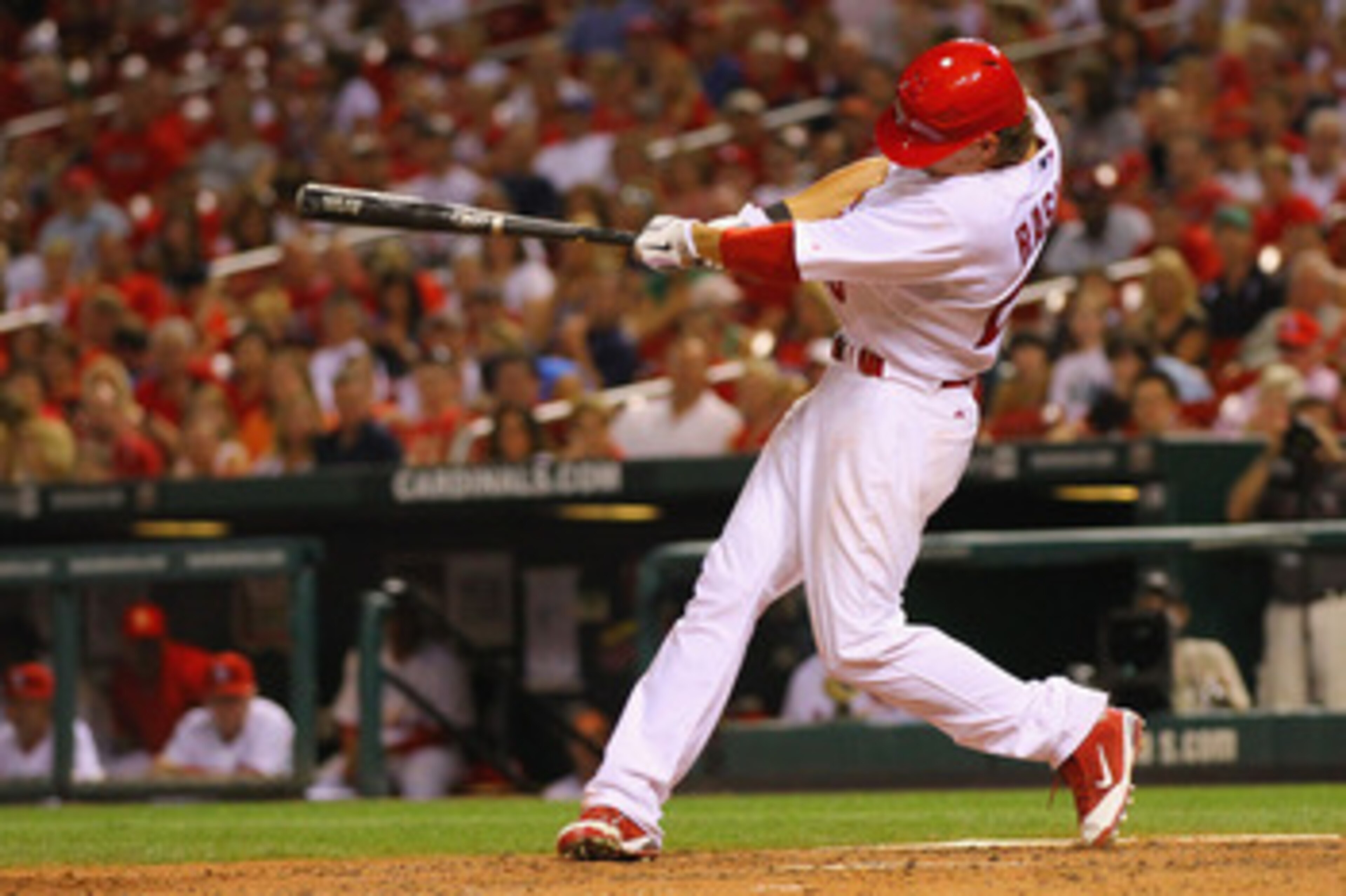 ST. LOUIS, MO - JUNE 2: Colby Rasmus #28 of the St. Louis Cardinals hits a grand slam against the San Francisco Giants at Busch Stadium on June 2, 2011 in St. Louis, Missouri. (Photo by Dilip Vishwanat/Getty Images) ST. LOUIS, MO - JUNE 2: Colby Rasmus #28 of the St. Louis Cardinals hits a grand slam against the San Francisco Giants at Busch Stadium on June 2, 2011 in St. Louis, Missouri. (Photo by Dilip Vishwanat/Getty Images)