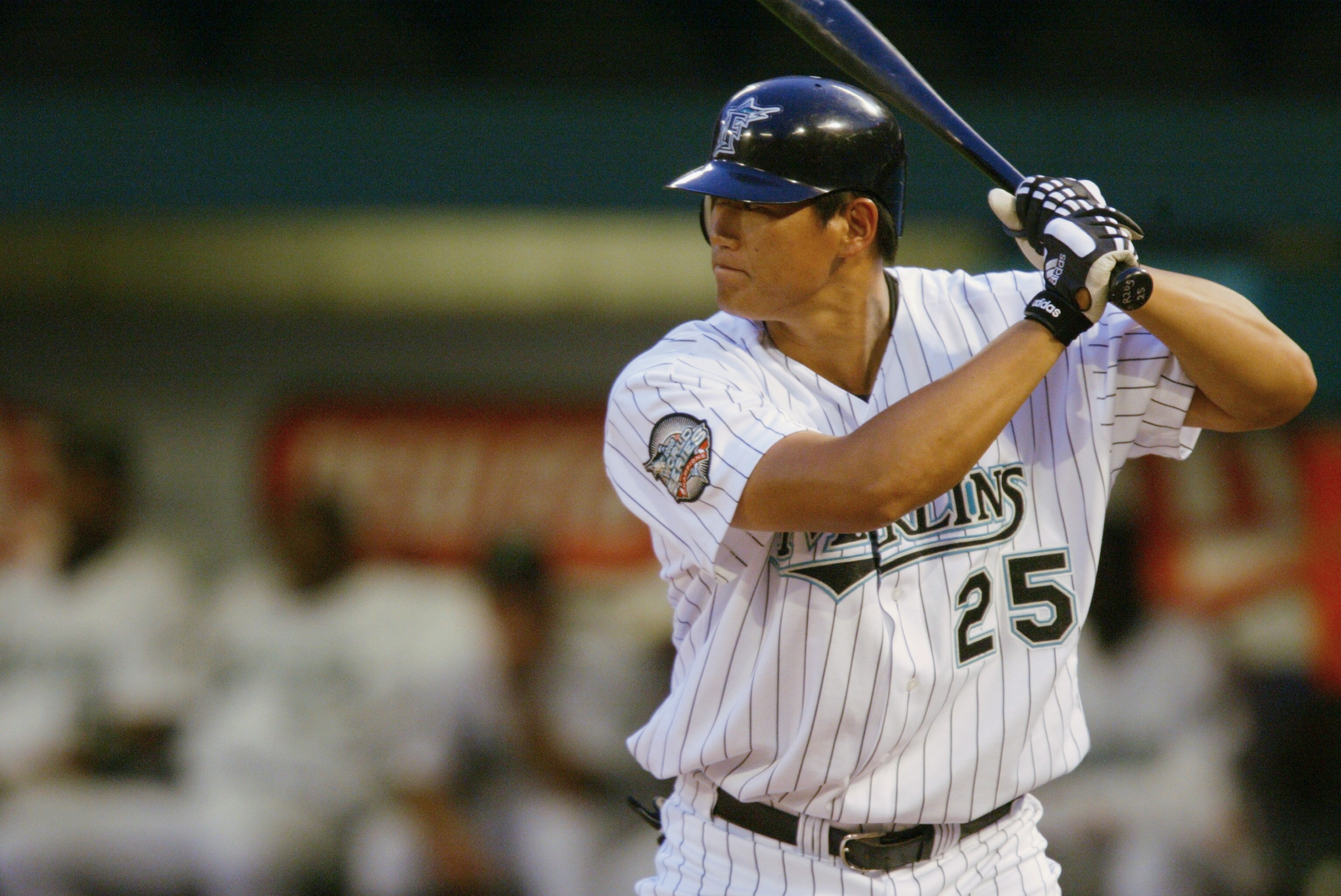 MIAMI - APRIL 8:  Hee Seop Choi #25 of the Florida Marlins bats against the Montreal Expos on April 8, 2004 at Pro Player Stadium in Miami, Florida.  The Expos defeated the Marlins 3-2.  (Photo by Victor Baldizon/Getty Images)