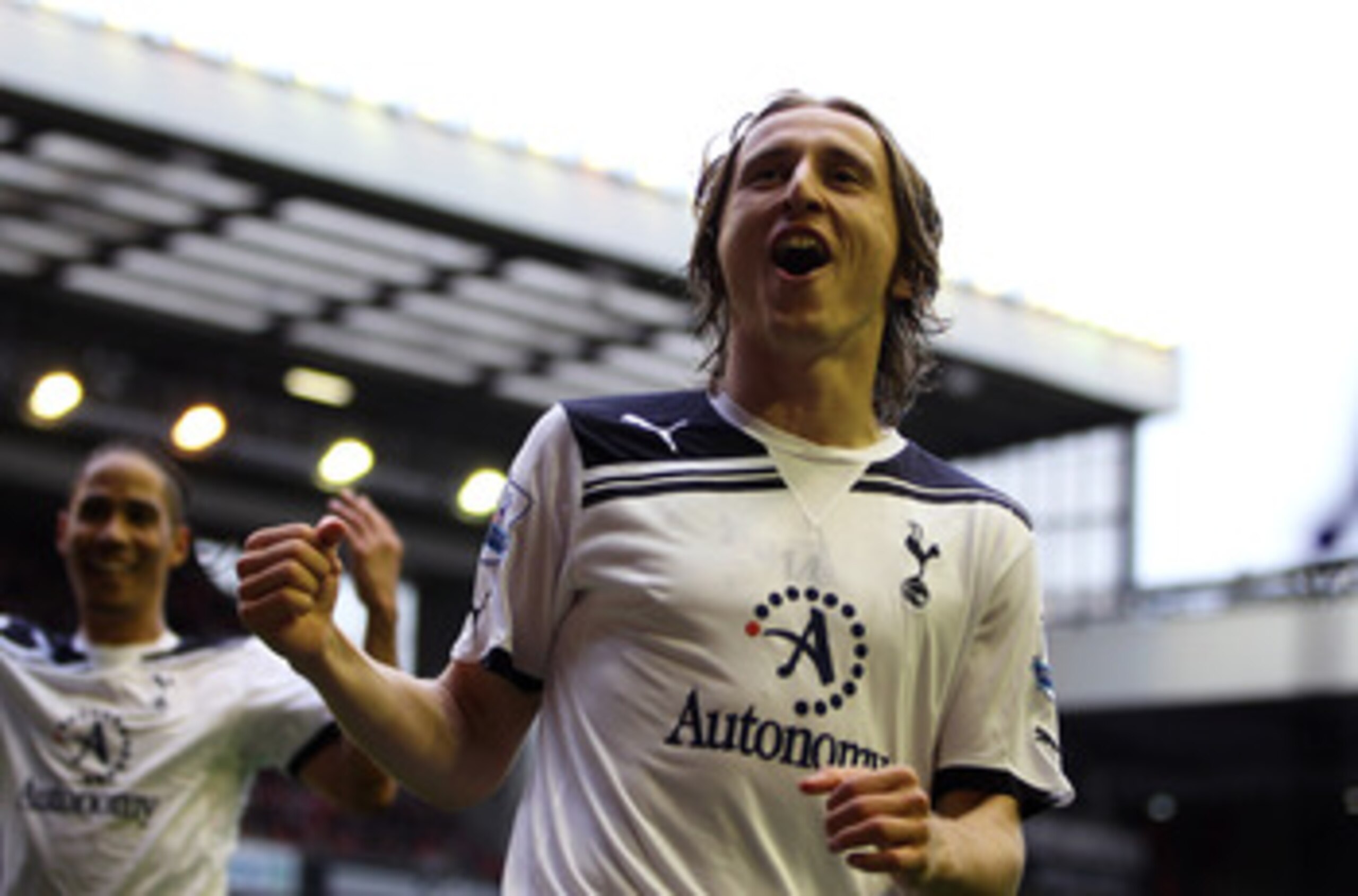 LIVERPOOL, ENGLAND - MAY 15:  Luka Modric of Spurs celebrates after scoring his team's second goal from the penalty spot during the Barclays Premier League match between Liverpool and Tottenham Hotspur at Anfield on May 15, 2011 in Liverpool, England.  (P