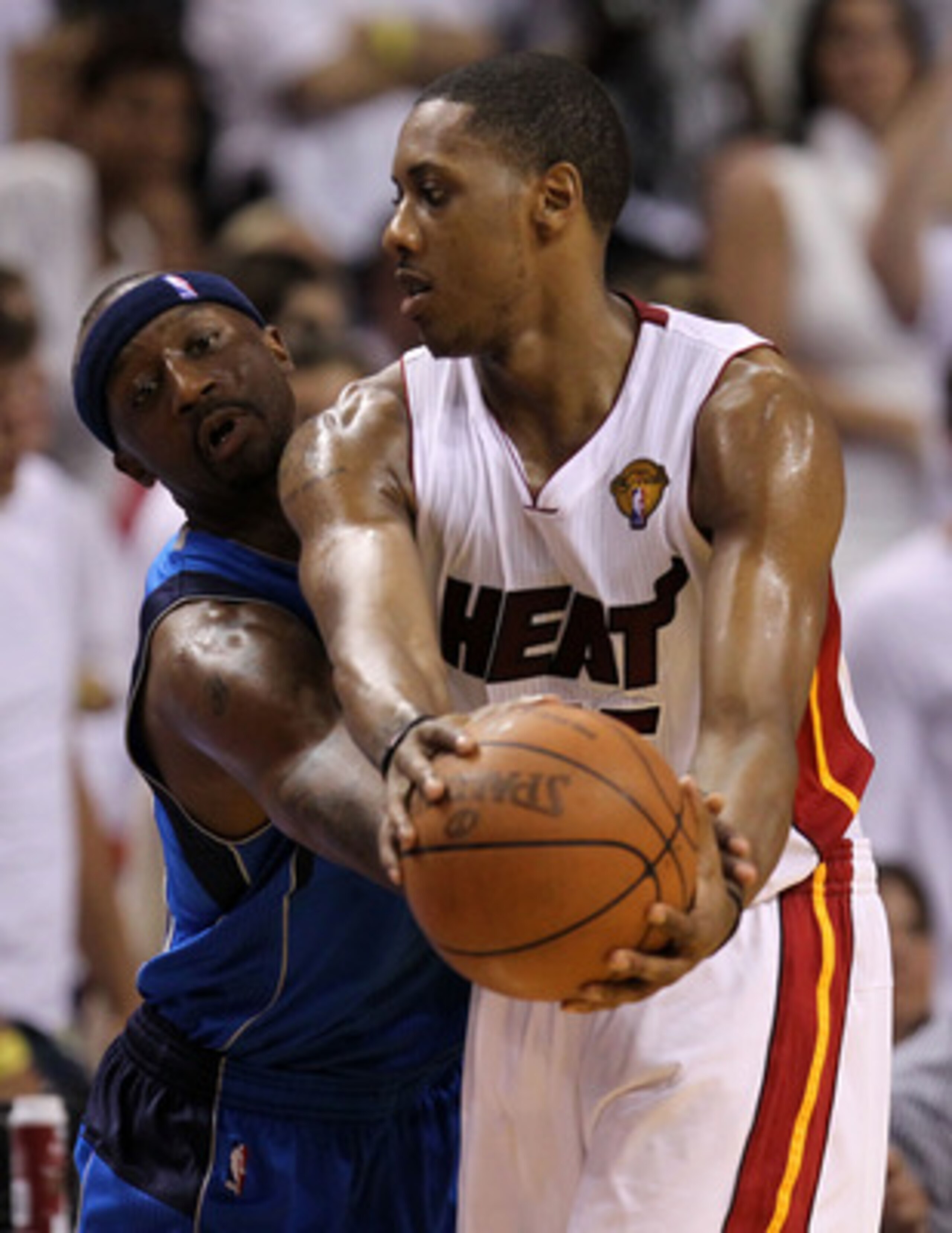 MIAMI, FL - JUNE 02:  Mario Chalmers #15 of the Miami Heat looks to pass against Jason Terry #31 of the Dallas Mavericks in Game Two of the 2011 NBA Finals at American Airlines Arena on June 2, 2011 in Miami, Florida. NOTE TO USER: User expressly acknowle