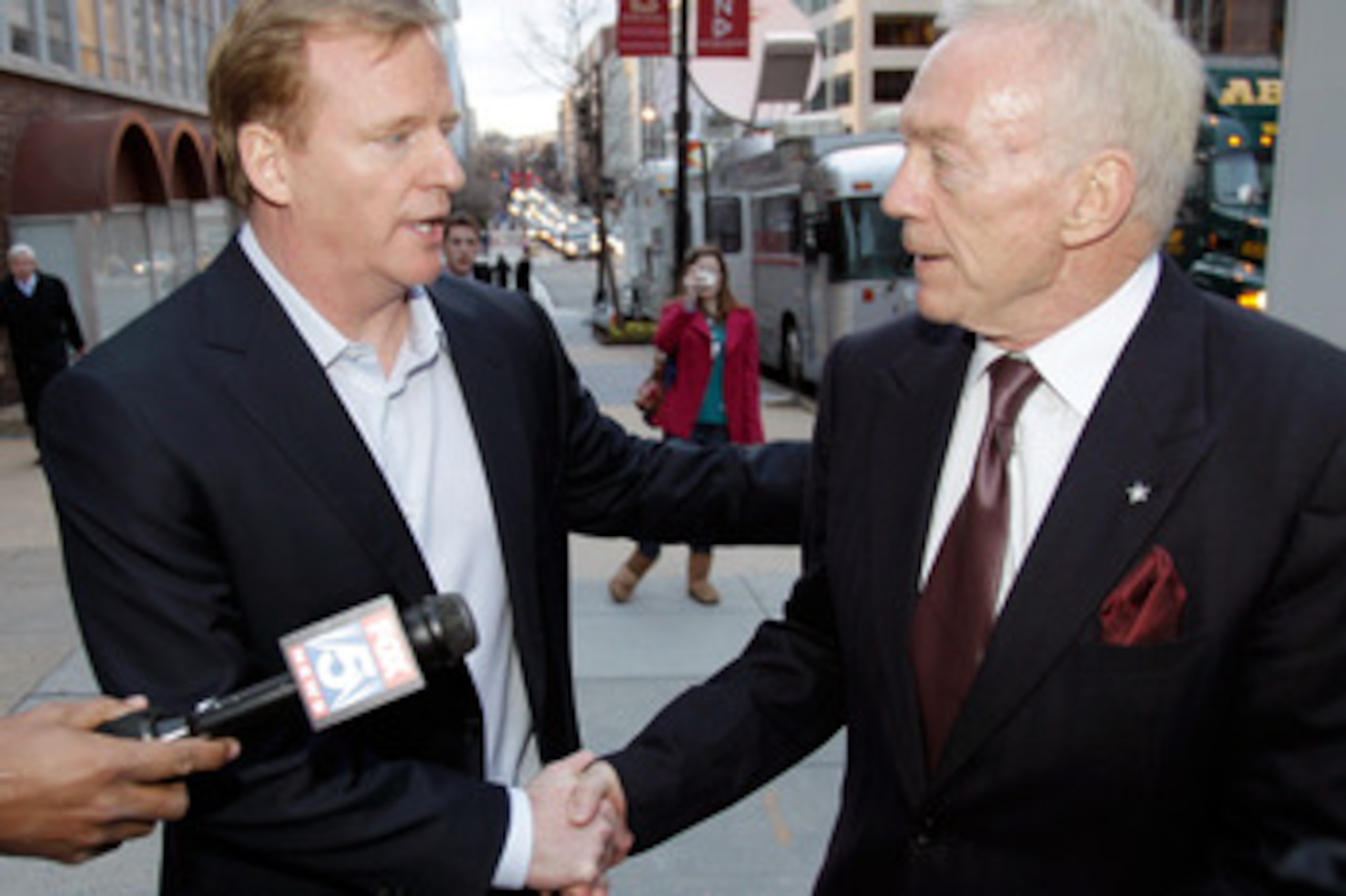 WASHINGTON, DC - MARCH 11:  NFL Commissioner Roger Goodell (L) and Dallas Cowboys owner Jerry Jones (R) talk outside the Federal Mediation and Conciliation Service building March 11, 2011 in Washington, DC. The NFLPA has filed for decertification and will