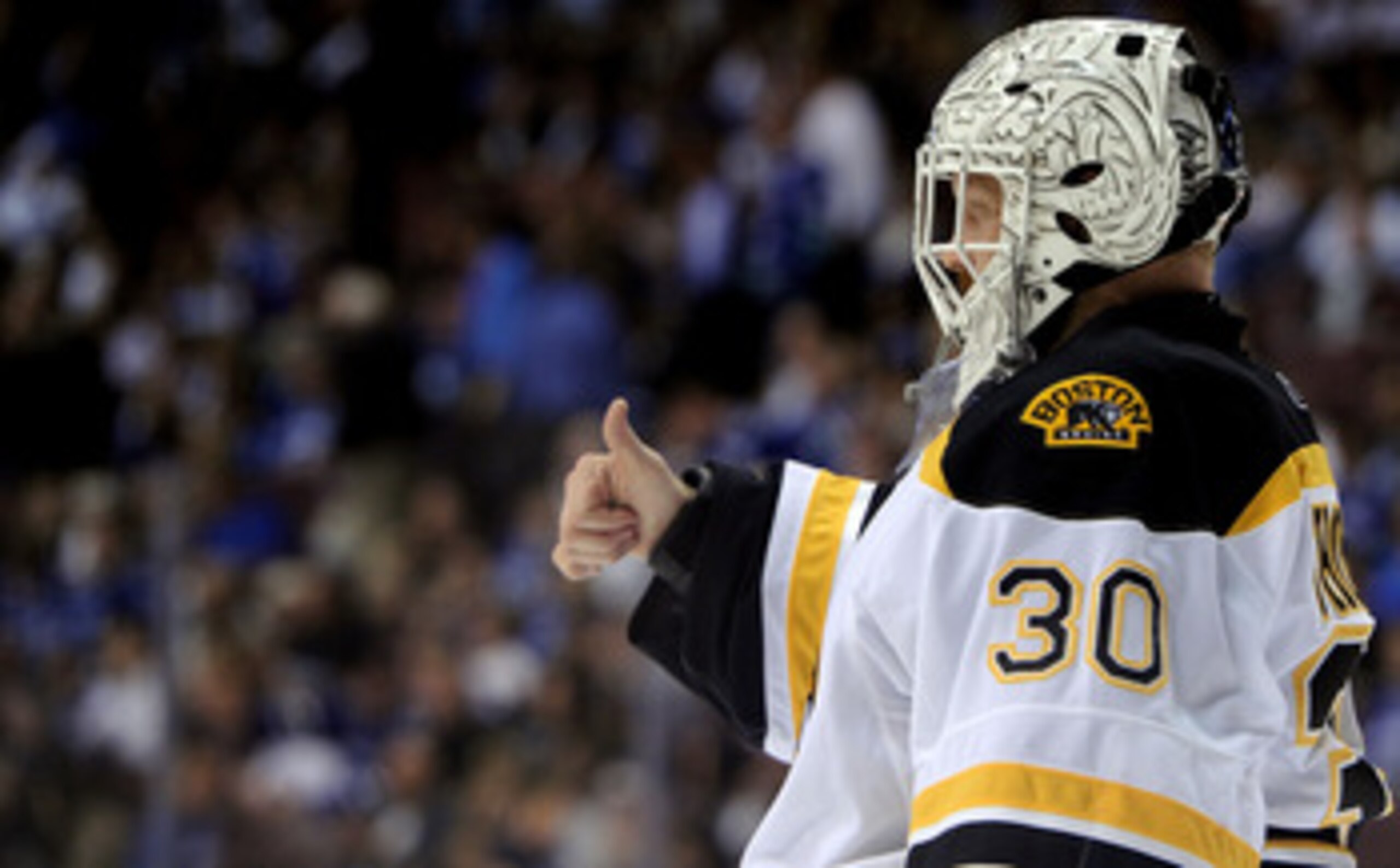 VANCOUVER, BC - JUNE 01:  Tim Thomas #30 of the Boston Bruins gives a thumbs up after a play against the Vancouver Canucks during game one of the 2011 NHL Stanley Cup Finals at Rogers Arena on June 1, 2011 in Vancouver, Canada.  (Photo by Harry How/Getty 
