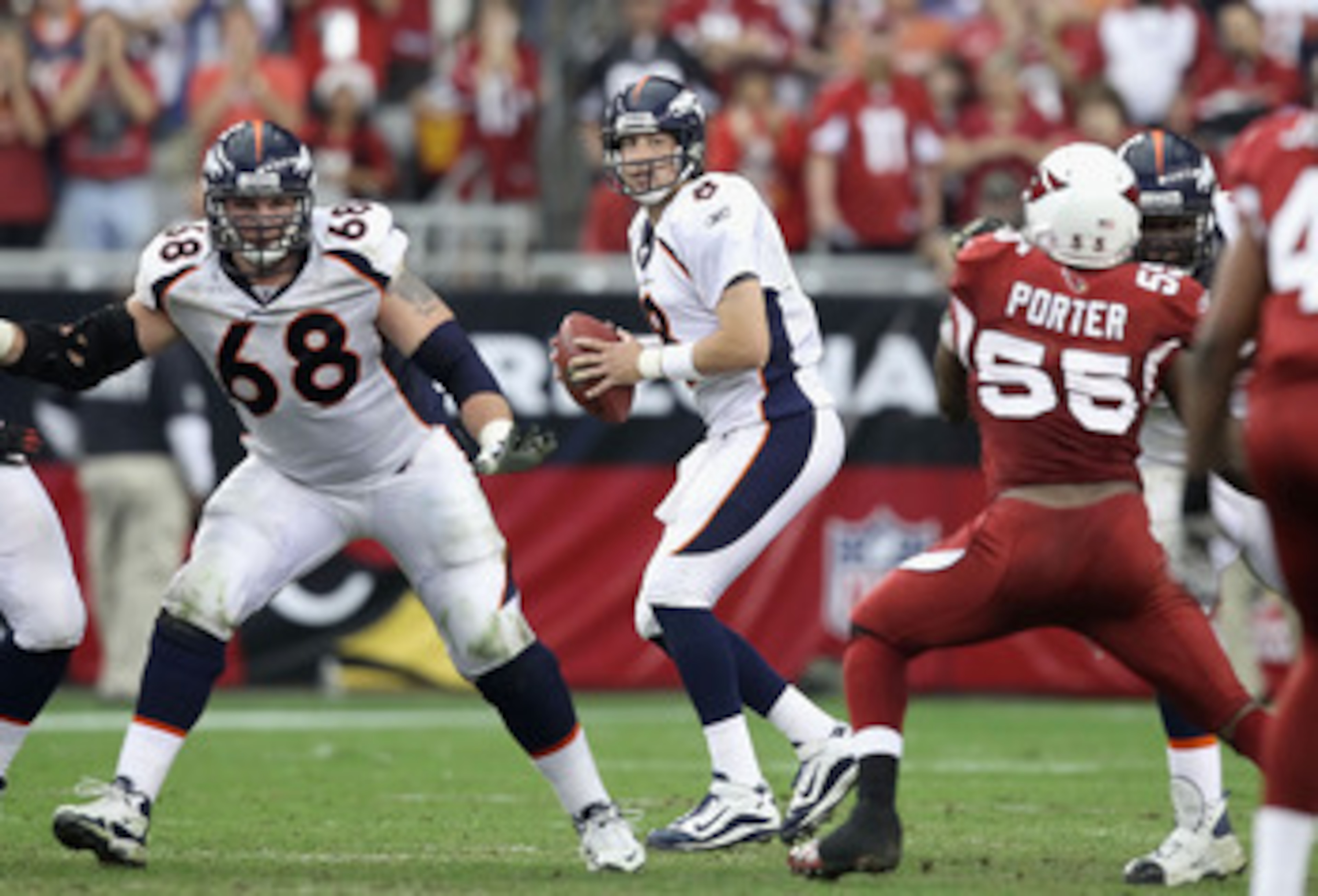 GLENDALE, AZ - DECEMBER 12:  Quarterback Kyle Orton #8 of the Denver Broncos drops back to pass during the NFL game against the Arizona Cardinals at the University of Phoenix Stadium on December 12, 2010 in Glendale, Arizona.  The Cardinals defeated the B