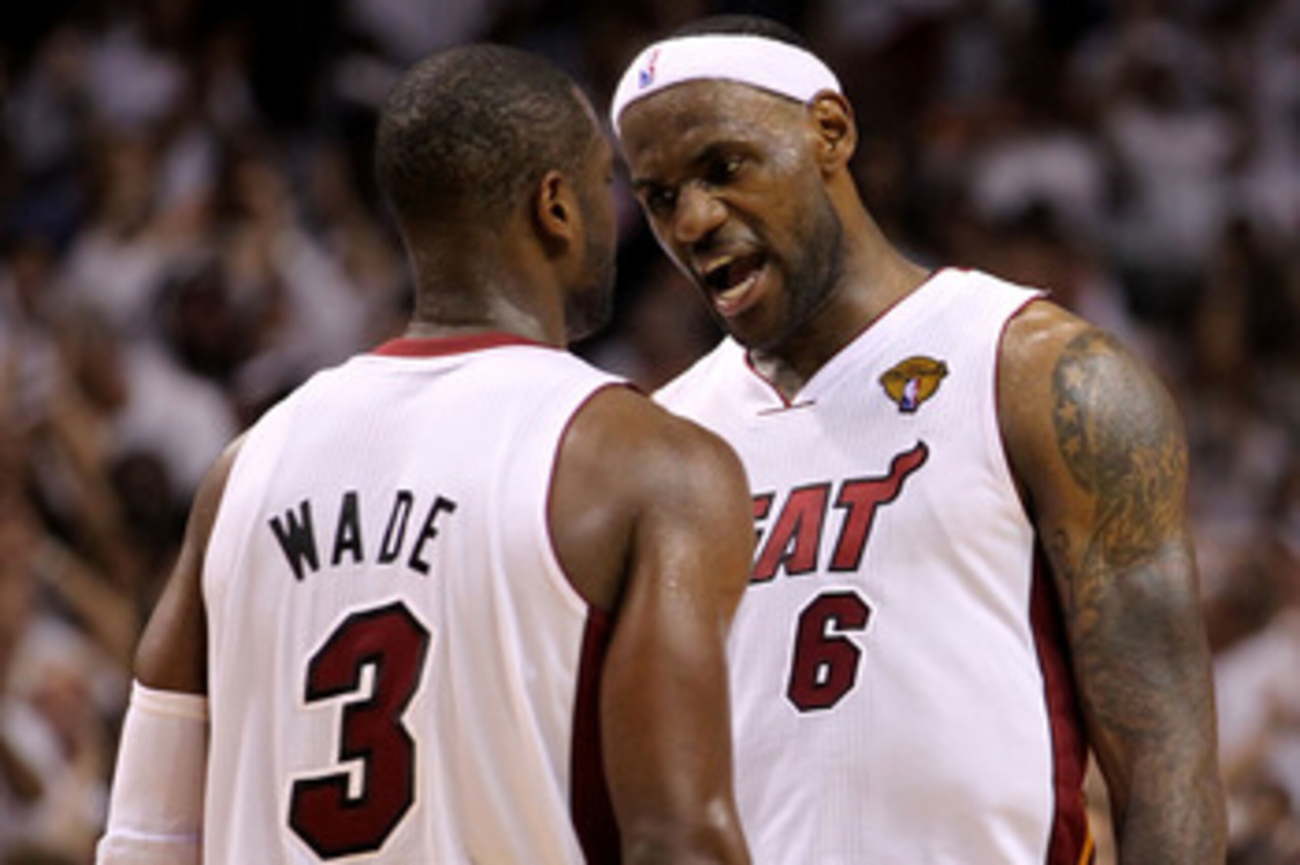 MIAMI, FL - JUNE 02:  Dwyane Wade #3 and LeBron James #6 of the Miami Heat react in the fourth quarter while taking on the Dallas Mavericks in Game Two of the 2011 NBA Finals at American Airlines Arena on June 2, 2011 in Miami, Florida. NOTE TO USER: User