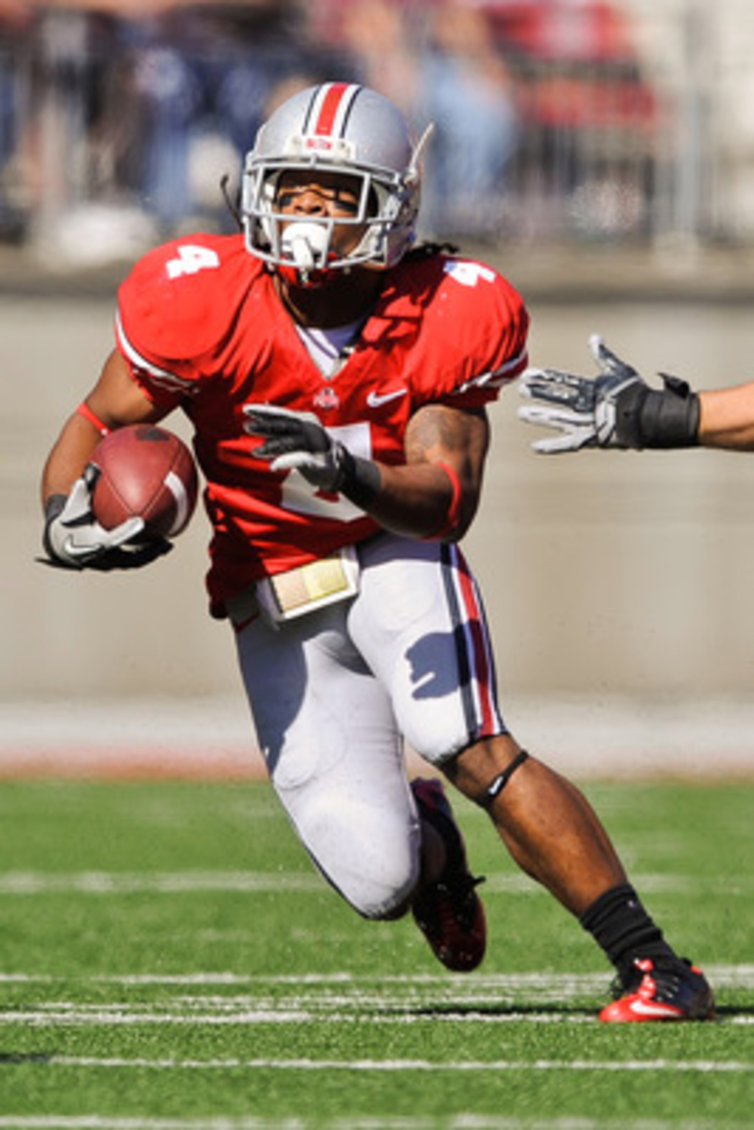 COLUMBUS, OH - OCTOBER 9:  Jaamal Berry #4 of the Ohio State Buckeyes runs with the ball against the Indiana Hoosiers at Ohio Stadium on October 9, 2010 in Columbus, Ohio.  (Photo by Jamie Sabau/Getty Images)