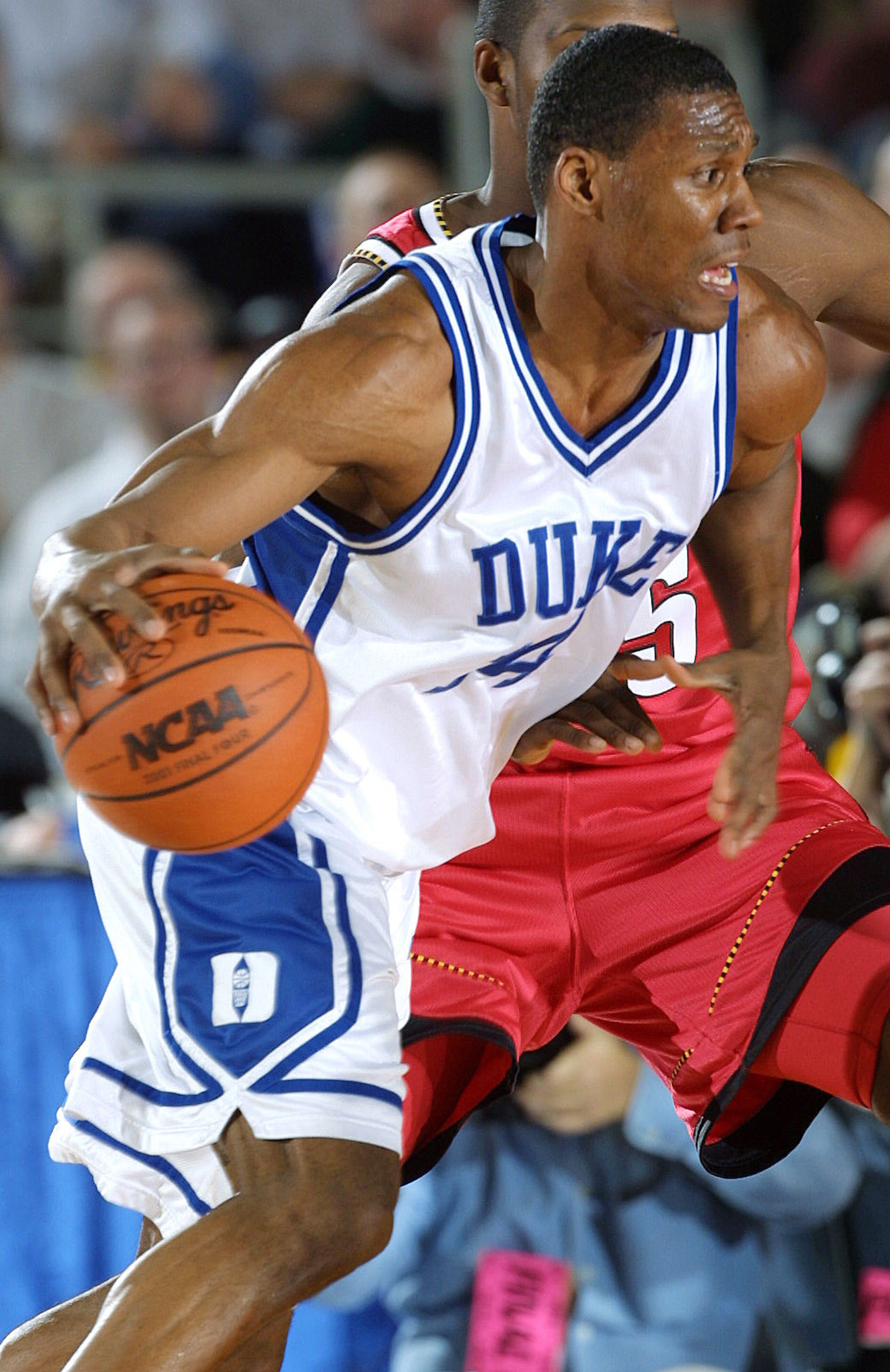 31 Mar 2001:  Nate James #14 of Duke drives around the Maryland defense during the semifinal of the Men's NCAA Basketball Final Four tournament at the Metrodome in Minneapolis, Minnesota.  DIGITAL IMAGE. Mandatory Credit: Brian Bahr/ALLSPORT