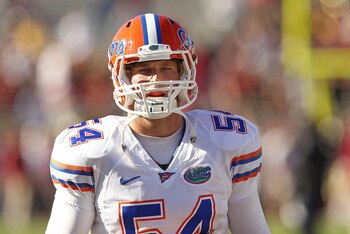 TALLAHASSEE, FL - NOVEMBER 27: Christoper Guido #54  of the Florida Gators warms up before a game against the Florida State Seminoles  at Doak Campbell Stadium on November 27, 2010 in Tallahassee, Florida.  (Photo by Mike Ehrmann/Getty Images)