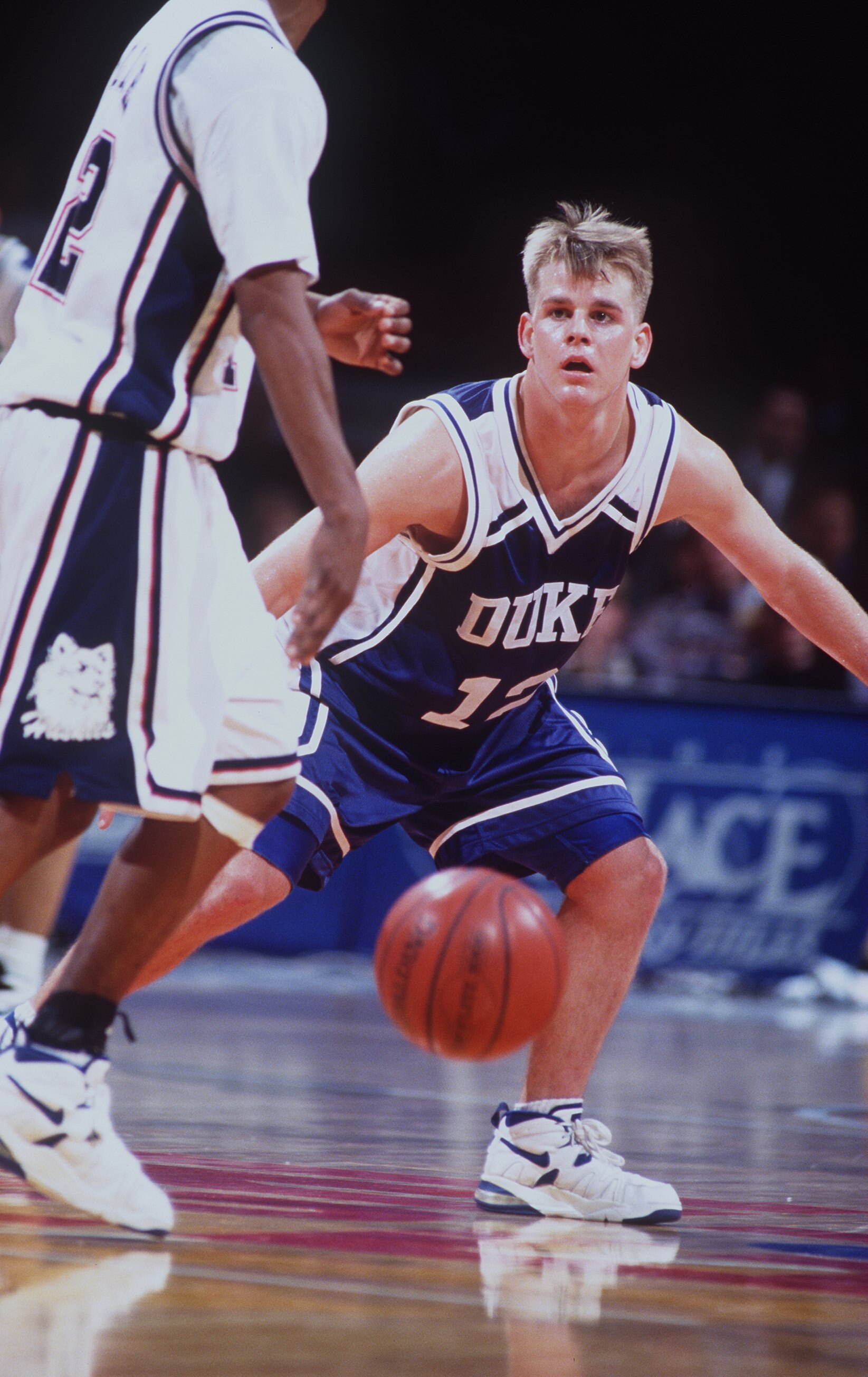 29 NOV 1994:  STEVE WOJCIECHOWSKI OF DUKE PLAYS DEFENSE AGAINST KEVIN OLLIE OF THE UNIVERSITY OF CONNECTICUT DURING THE 1994 GREAT EIGHT TOURNAMENT AT THE PALACE IN AUBURN HILLS MICHIGAN. Mandatory Credit: Todd Rosenberg/ALLSPORT