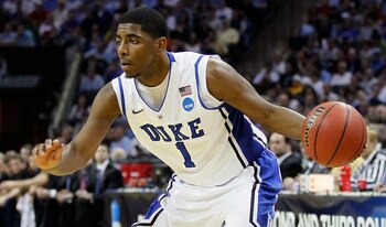 CHARLOTTE, NC - MARCH 20: Kyrie Irving #1 of the Duke Blue Devils moves the ball while taking on the Michigan Wolverines during the third round of the 2011 NCAA men's basketball tournament at Time Warner Cable Arena on March 20, 2011 in Charlotte, North CHARLOTTE, NC - MARCH 20: Kyrie Irving #1 of the Duke Blue Devils moves the ball while taking on the Michigan Wolverines during the third round of the 2011 NCAA men's basketball tournament at Time Warner Cable Arena on March 20, 2011 in Charlotte, North
