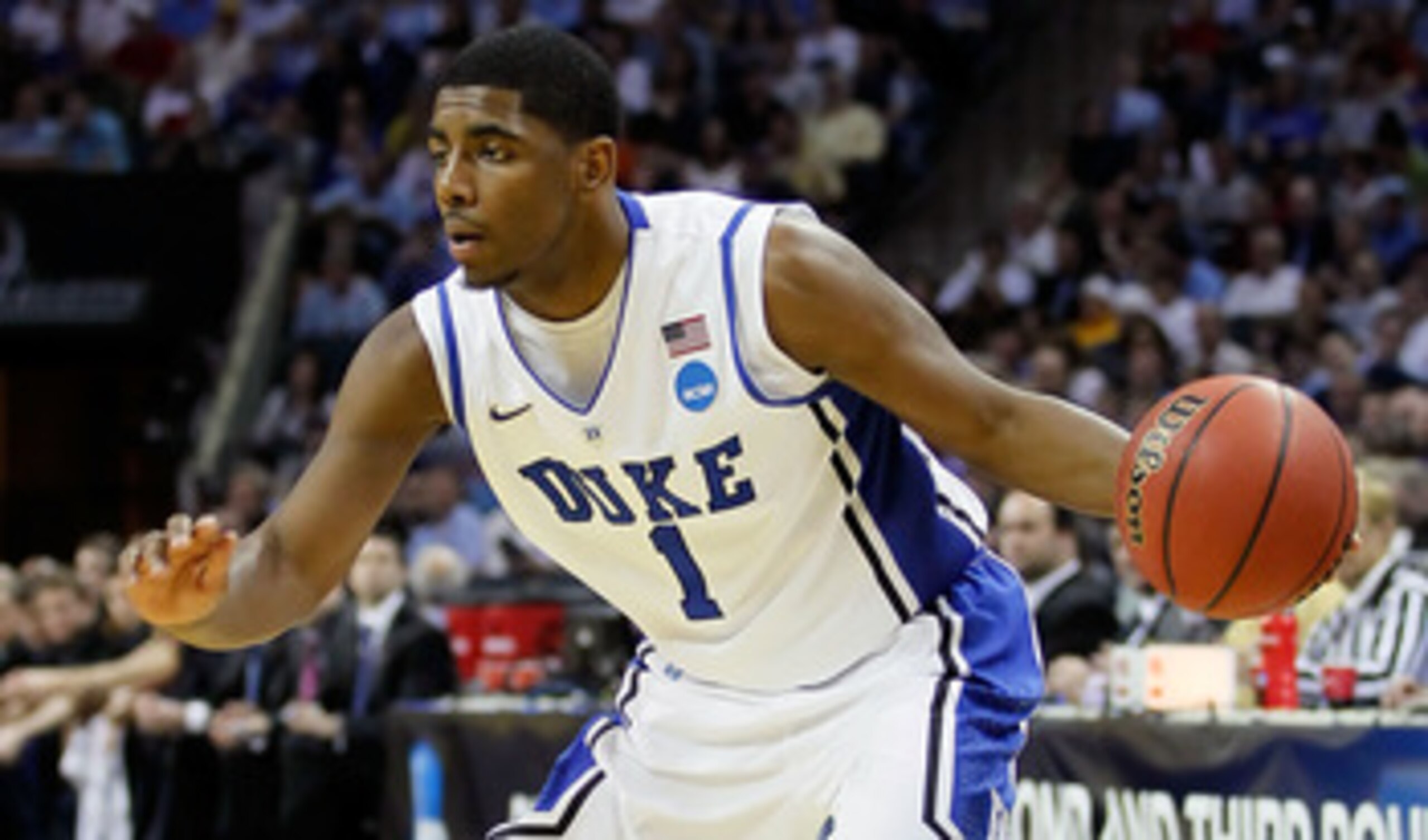 CHARLOTTE, NC - MARCH 20:  Kyrie Irving #1 of the Duke Blue Devils moves the ball while taking on the Michigan Wolverines during the third round of the 2011 NCAA men's basketball tournament at Time Warner Cable Arena on March 20, 2011 in Charlotte, North