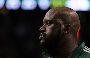 LOS ANGELES, CA - FEBRUARY 19:  Shaquille O'Neal of the Boston Celtics with girlfriend Nicole 'Hoopz' Alexander sit courtside as they attend NBA All-Star Saturday night presented by State Farm at Staples Center on February 19, 2011 in Los Angeles, Califor