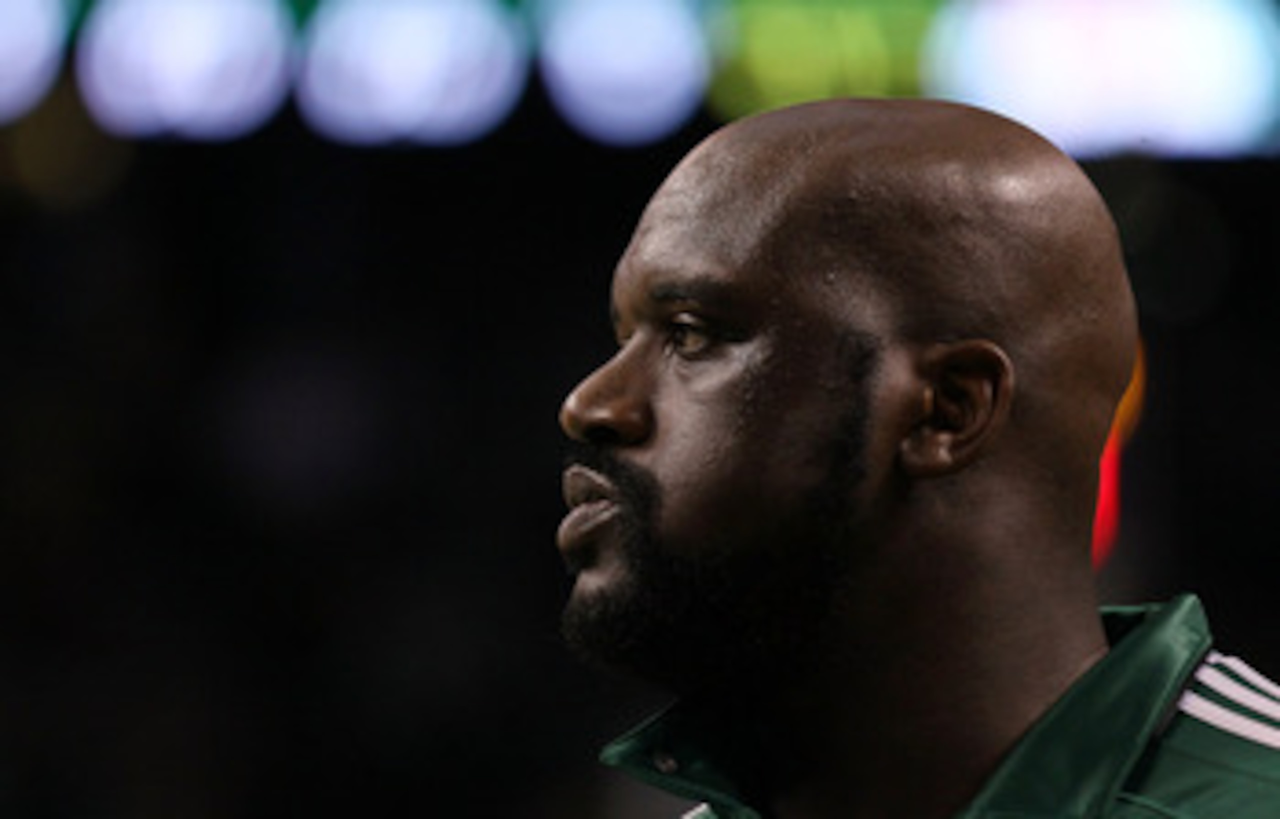 LOS ANGELES, CA - FEBRUARY 19:  Shaquille O'Neal of the Boston Celtics with girlfriend Nicole 'Hoopz' Alexander sit courtside as they attend NBA All-Star Saturday night presented by State Farm at Staples Center on February 19, 2011 in Los Angeles, Califor