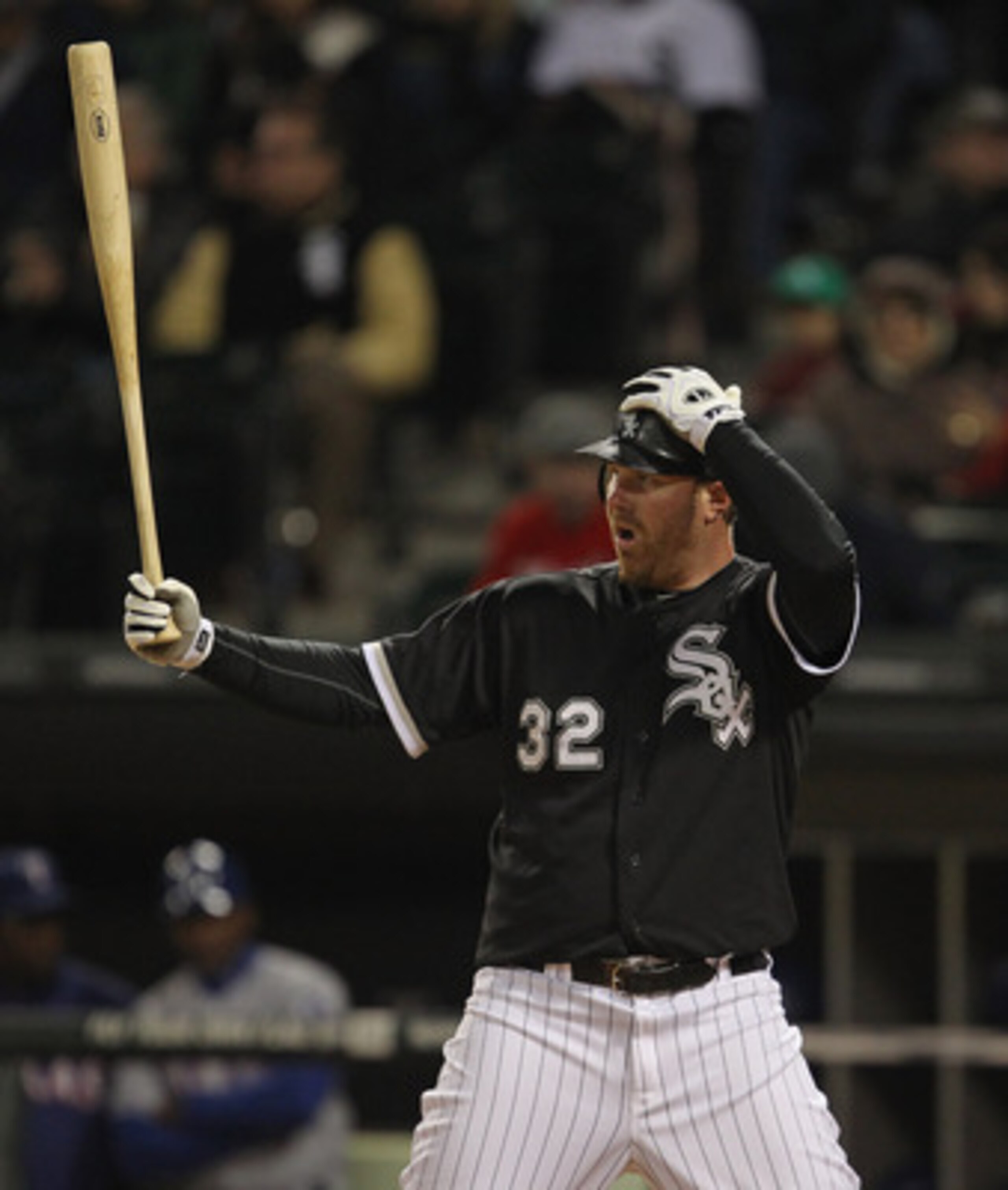 CHICAGO, IL - MAY 16: Adam Dunn #32 of the Chicago White Sox prepares to bat against the Texas Rangers at U.S. Cellular Field on May 16, 2011 in Chicago, Illinois. The Rangers defeated the White Sox 4-0. (Photo by Jonathan Daniel/Getty Images)