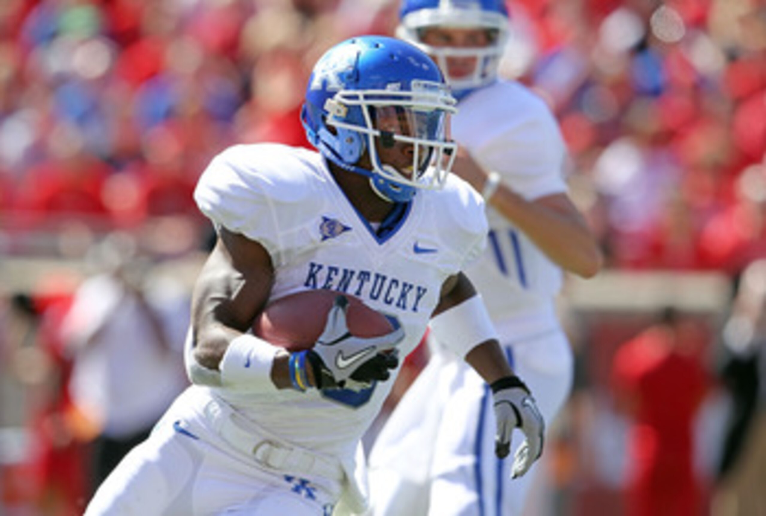 LOUISVILLE, KY - SEPTEMBER 04:  Randall Cobb #18 of the Kentucky Wildcats runs with the ball during the game against the Louisville Cardinals at Papa John's Cardinal Stadium on September 4, 2010 in Louisville, Kentucky.  (Photo by Andy Lyons/Getty Images)