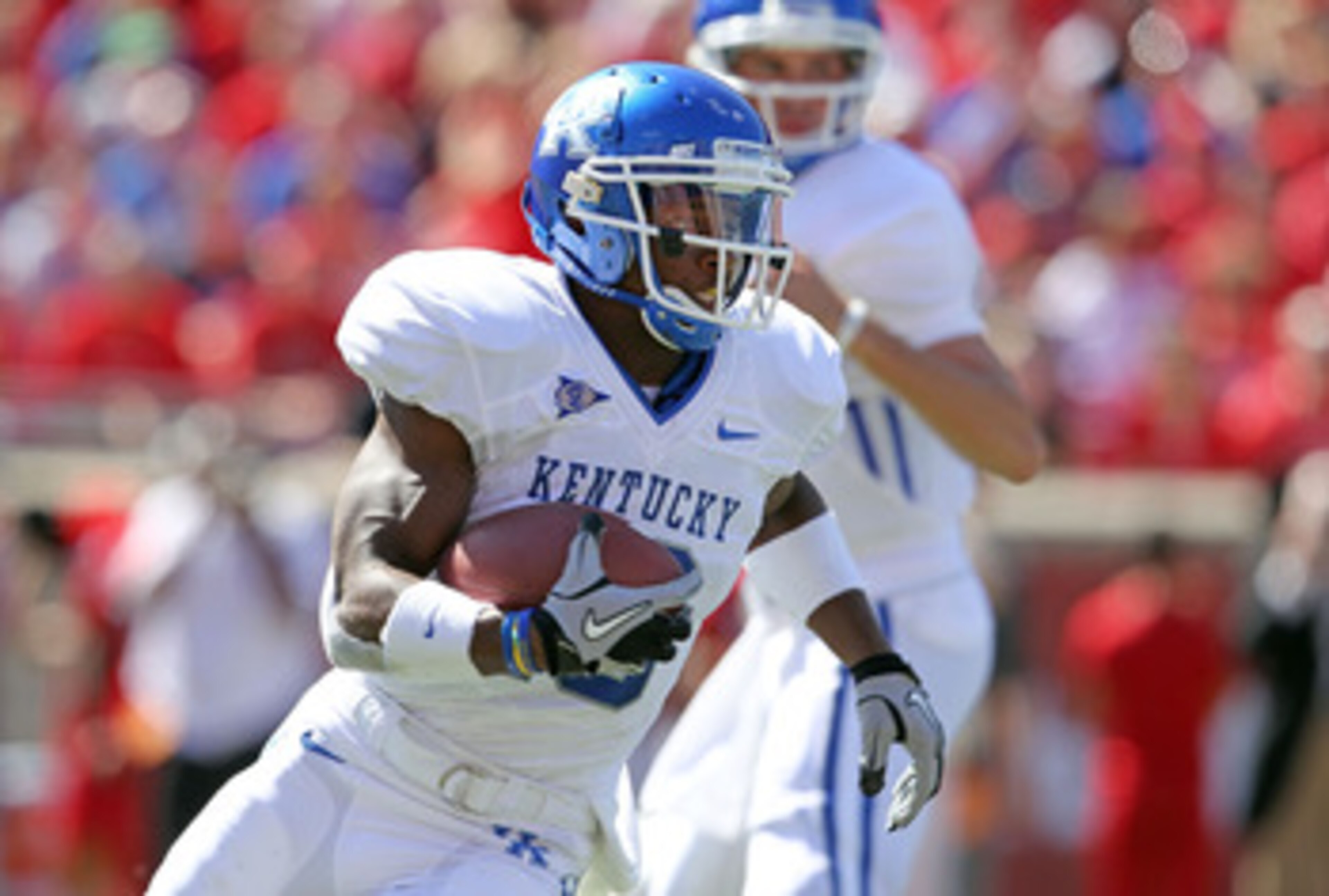 LOUISVILLE, KY - SEPTEMBER 04:  Randall Cobb #18 of the Kentucky Wildcats runs with the ball during the game against the Louisville Cardinals at Papa John's Cardinal Stadium on September 4, 2010 in Louisville, Kentucky.  (Photo by Andy Lyons/Getty Images)