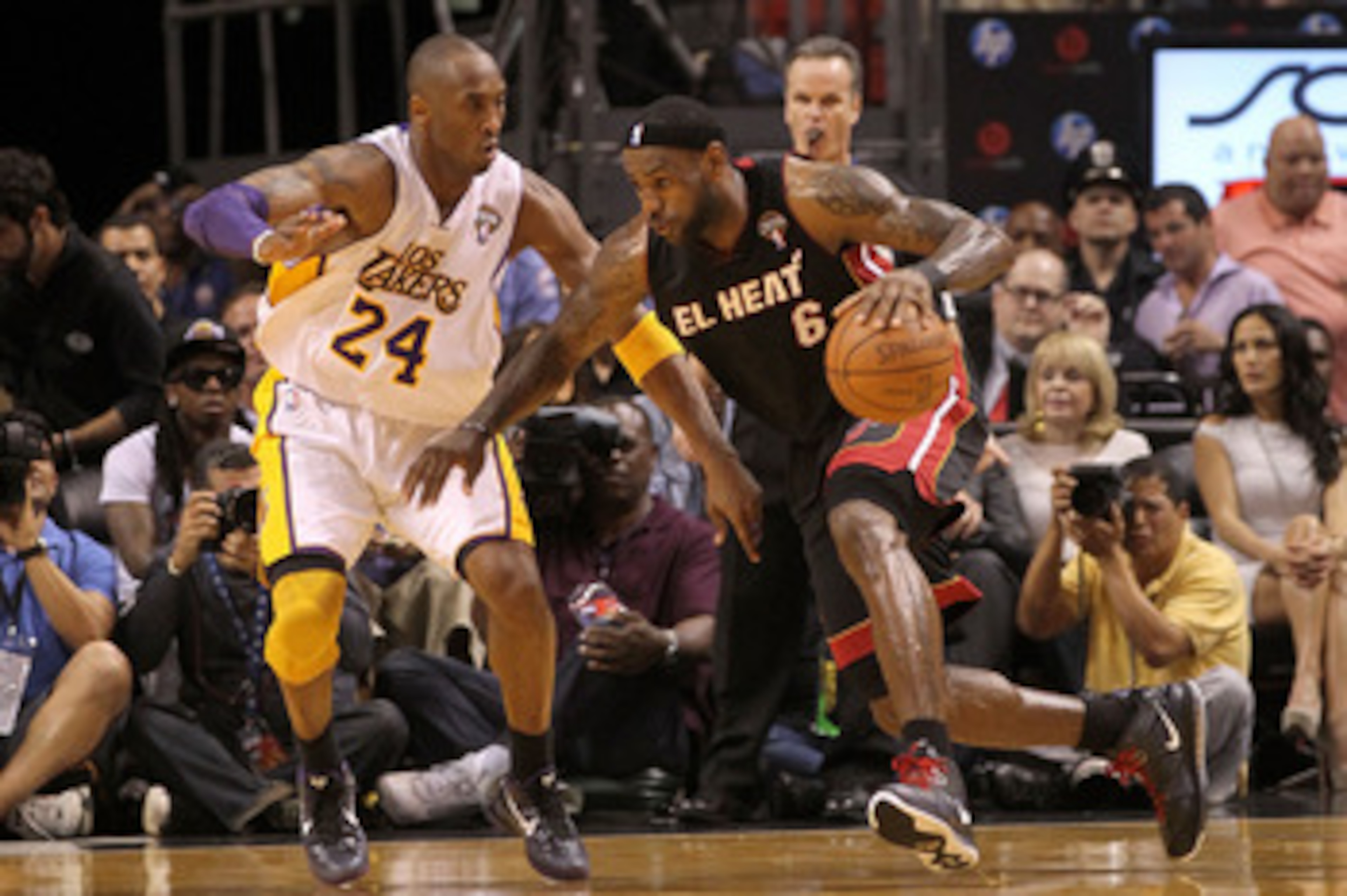 MIAMI, FL - MARCH 10: LeBron James #6 of the Miami Heat posts up Kobe Bryant #24 of the Los Angeles Lakers during a game at American Airlines Arena on March 10, 2011 in Miami, Florida. NOTE TO USER: User expressly acknowledges and agrees that, by downl MIAMI, FL - MARCH 10: LeBron James #6 of the Miami Heat posts up Kobe Bryant #24 of the Los Angeles Lakers during a game at American Airlines Arena on March 10, 2011 in Miami, Florida. NOTE TO USER: User expressly acknowledges and agrees that, by downl