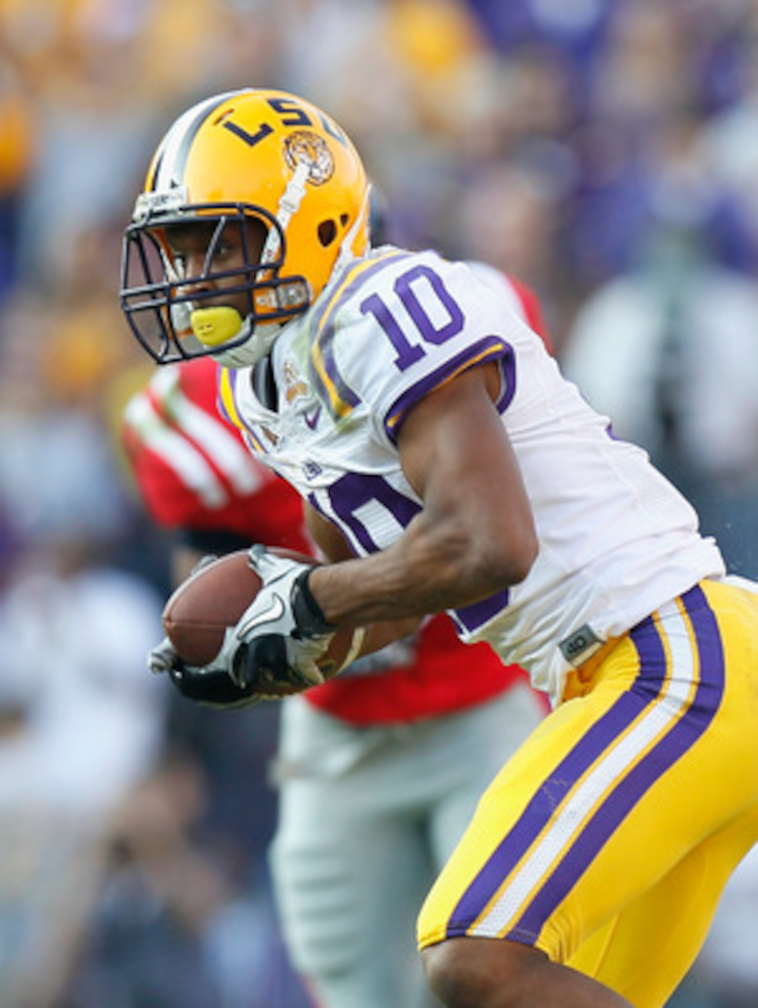 BATON ROUGE, LA - NOVEMBER 20:  Jesse Grandy #10 of the Louisiana State University Tigers against the Ole Miss Rebels at Tiger Stadium on November 20, 2010 in Baton Rouge, Louisiana.  (Photo by Kevin C. Cox/Getty Images)