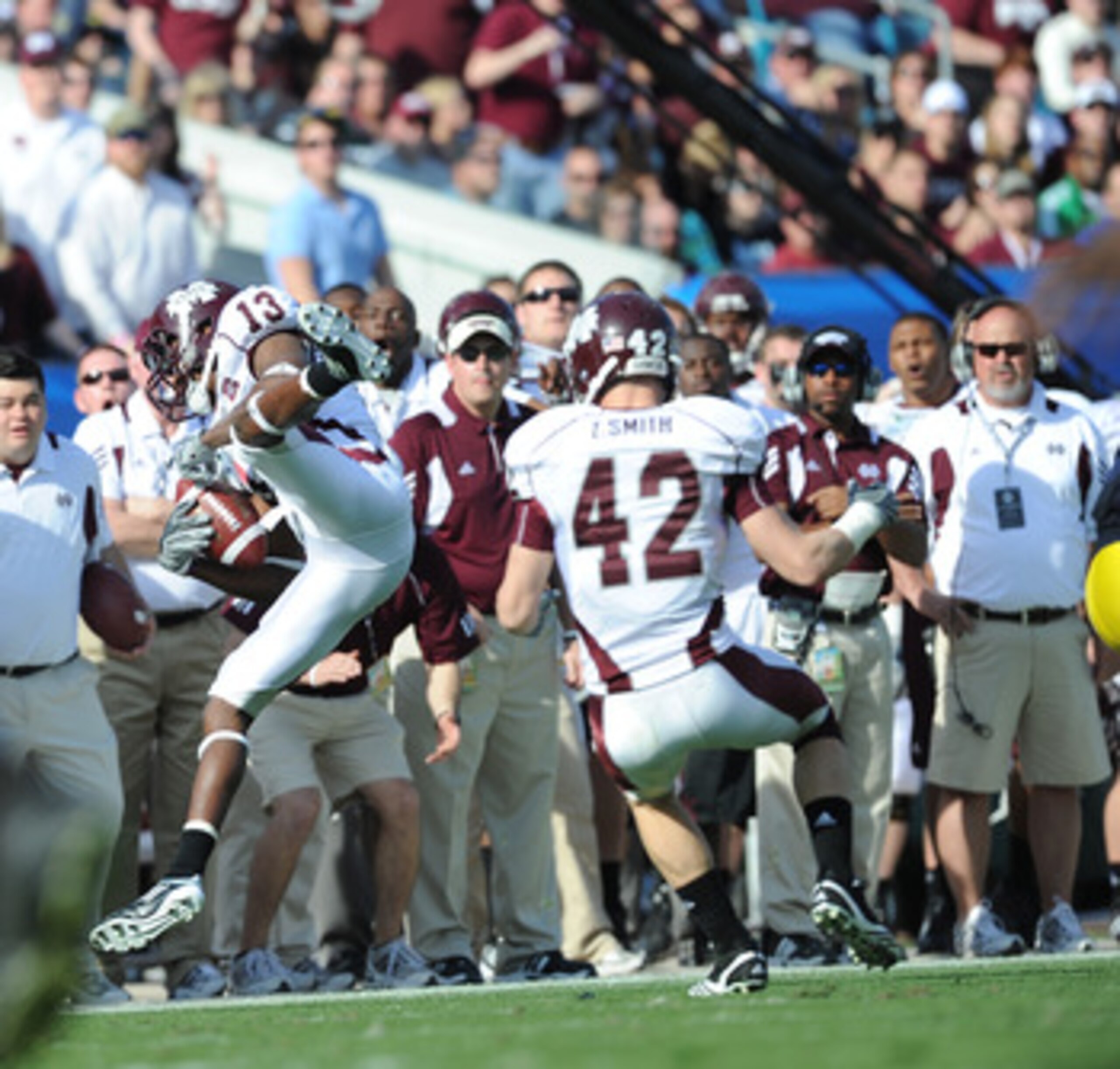 JACKSONVILLE, FL - JANUARY 01:  Cornerbank Johnthan Banks #13 of the Mississippi State Bulldogs intercepts a pass against the Michigan Wolverines during the Gator Bowl at EverBank Field on January 1, 2011 in Jacksonville, Florida  (Photo by Rick Dole/Gett