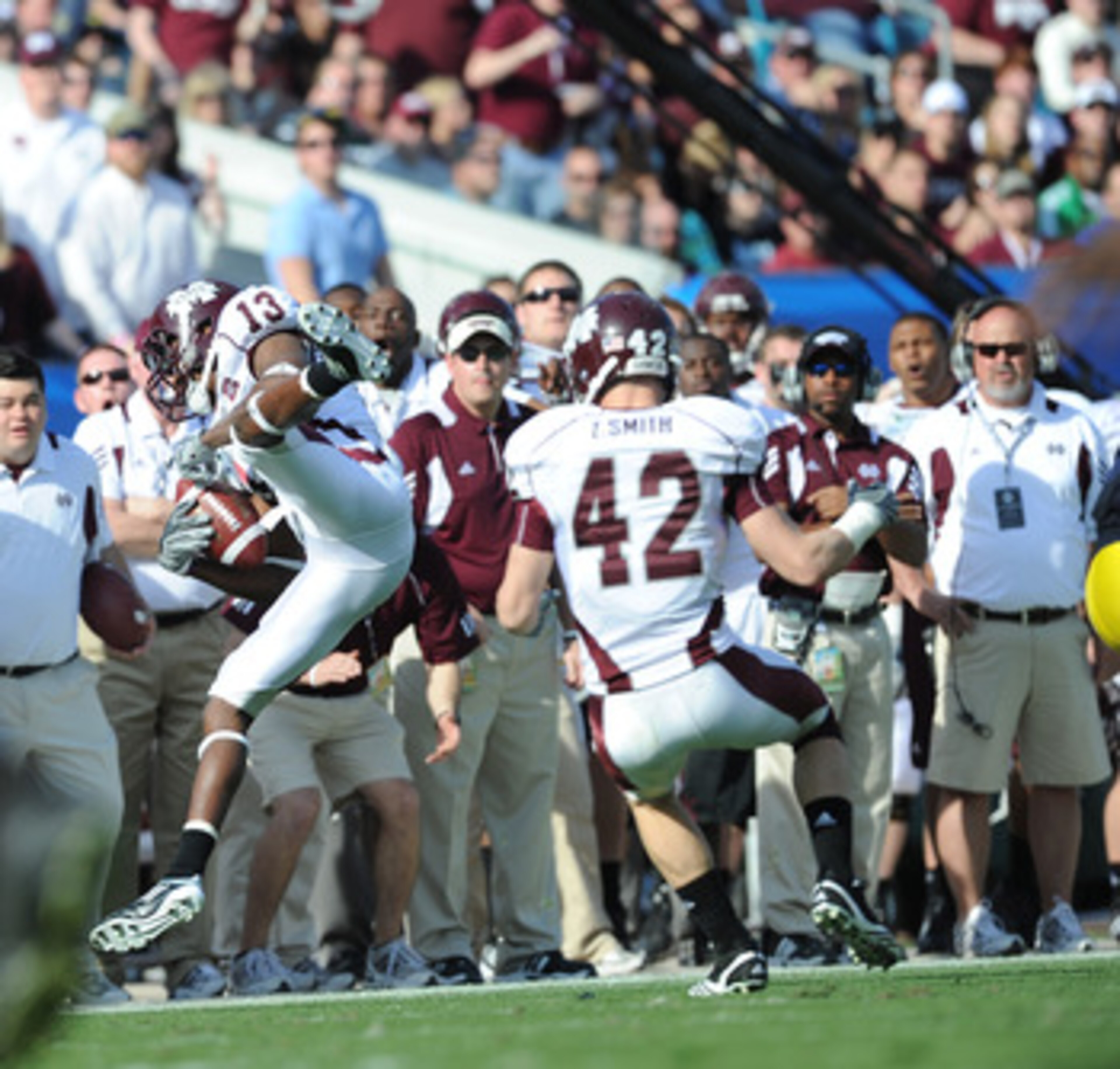 JACKSONVILLE, FL - JANUARY 01:  Cornerbank Johnthan Banks #13 of the Mississippi State Bulldogs intercepts a pass against the Michigan Wolverines during the Gator Bowl at EverBank Field on January 1, 2011 in Jacksonville, Florida  (Photo by Rick Dole/Gett