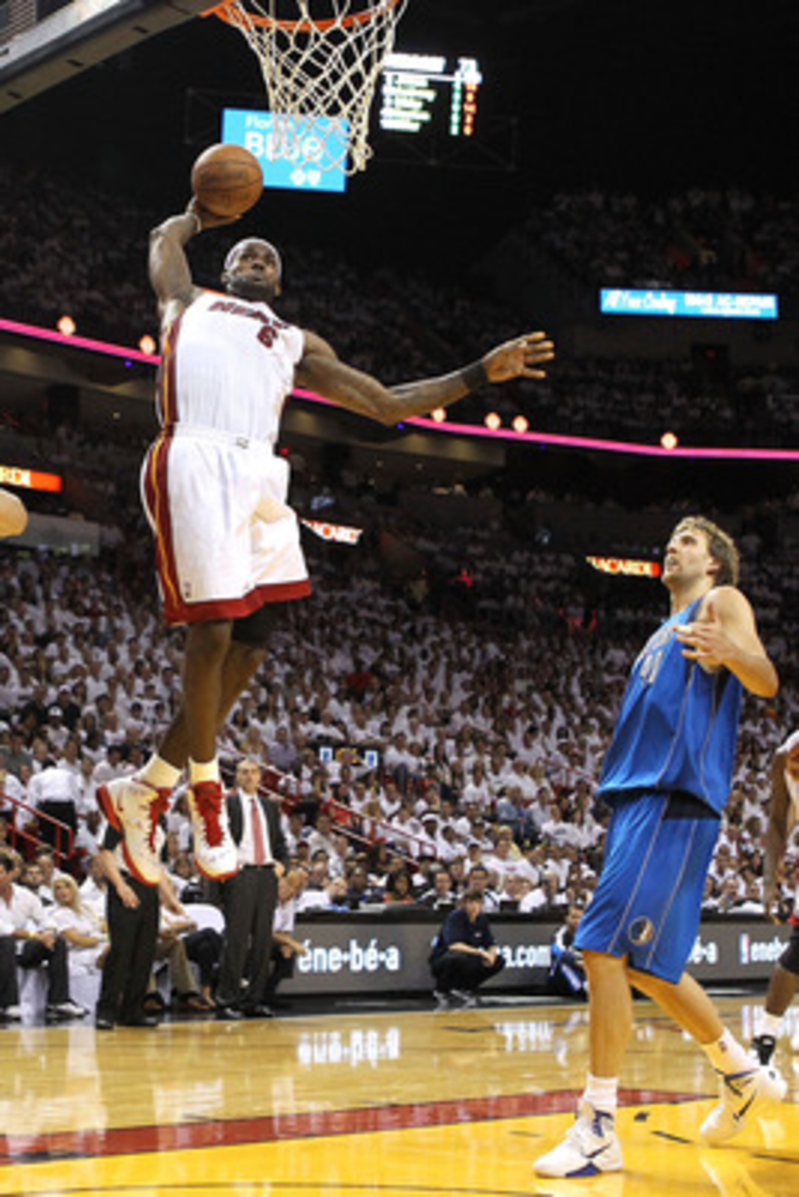 MIAMI, FL - JUNE 02:  LeBron James #6 of the Miami Heat dunks the ball in the third quarter in front of Dirk Nowitzki #41 of the Dallas Mavericks in Game Two of the 2011 NBA Finals at American Airlines Arena on June 2, 2011 in Miami, Florida. NOTE TO USER