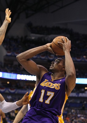 DALLAS, TX - MAY 06:  Center Andrew Bynum #17 of the Los Angeles Lakers takes a shot against the Dallas Mavericks in Game Three of the Western Conference Semifinals during the 2011 NBA Playoffs on May 6, 2011 at American Airlines Center in Dallas, Texas. 