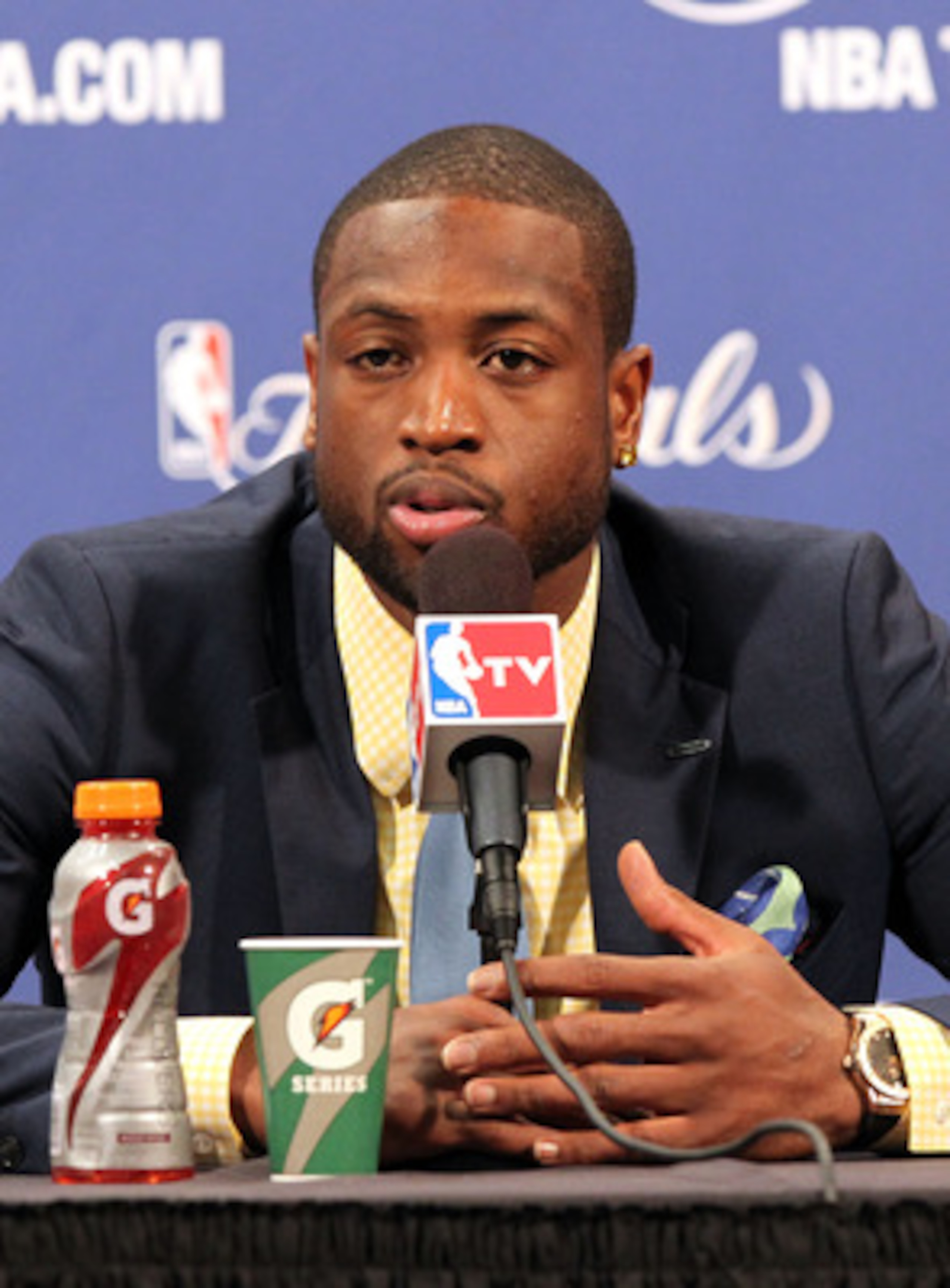 MIAMI, FL - JUNE 02:  Dwyane Wade #3 of the Miami Heat answers questions from the media at a post game press conference after the Heat lost 95-93 against the Dallas Mavericks in Game Two of the 2011 NBA Finals at American Airlines Arena on June 2, 2011 in