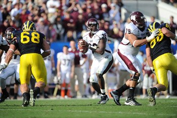JACKSONVILLE, FL - JANUARY 01:  Quarterback Chris Relf #36 of the Mississippi State Bulldogs passes against the Michigan Wolverines during the Gator Bowl at EverBank Field on January 1, 2011 in Jacksonville, Florida  (Photo by Rick Dole/Getty Images)