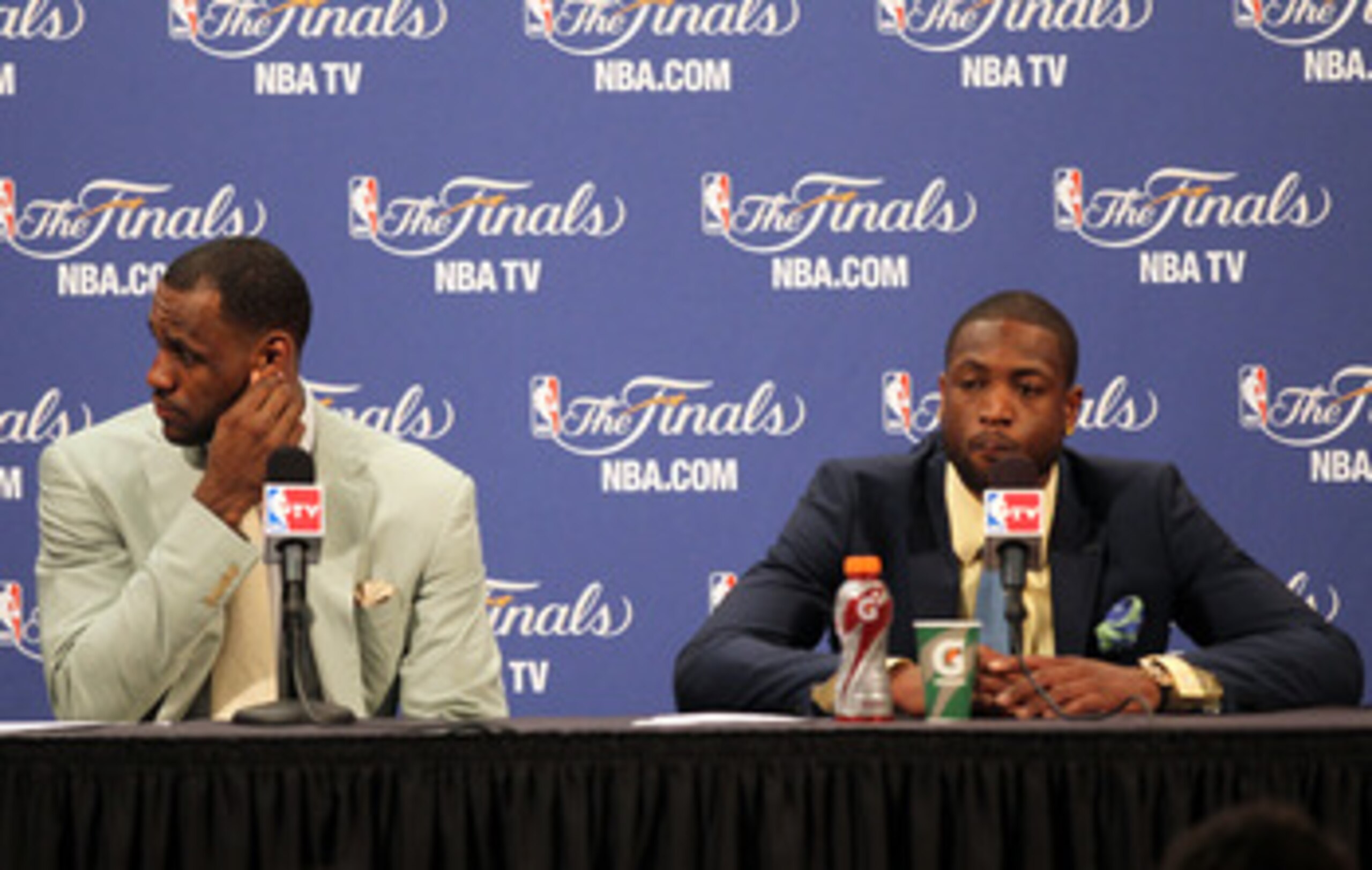 MIAMI, FL - JUNE 02:  (L-R) LeBron James #6 and Dwyane Wade #3 of the Miami Heat answers questions from the media during a post game press conference after they the Heat lost 95-93 against the Dallas Mavericks in Game Two of the 2011 NBA Finals at America