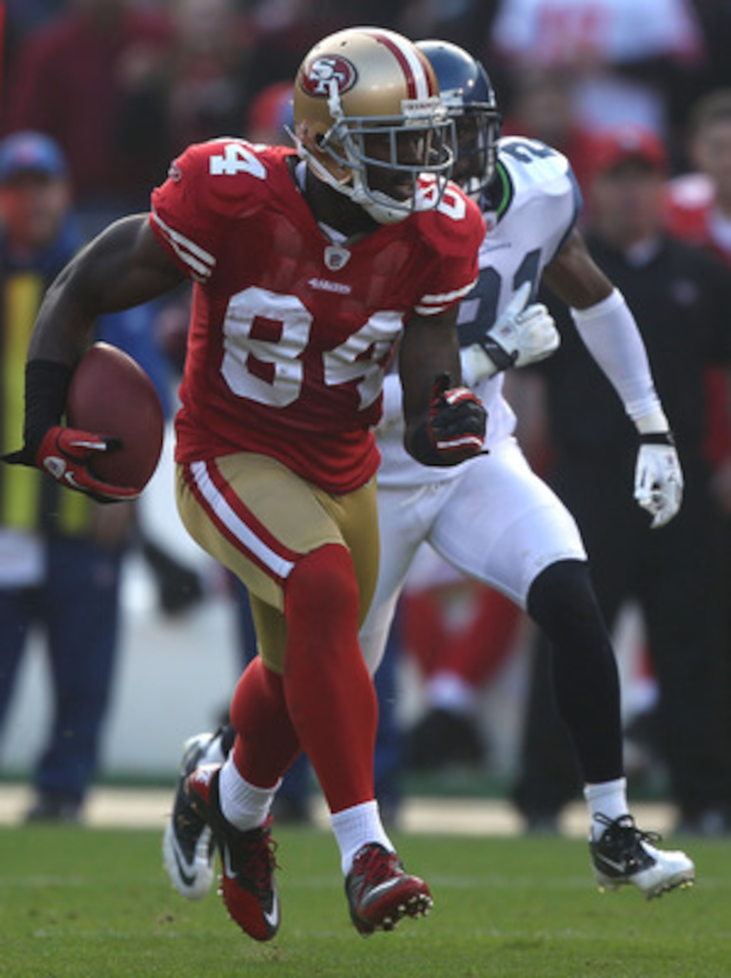 SAN FRANCISCO - DECEMBER 12: Josh Morgan #84 of the San Francisco 49ers runs after a catch against the Seattle Seahawks during an NFL game at Candlestick Park on December 12, 2010 in San Francisco, California. (Photo by Jed Jacobsohn/Getty Images) SAN FRANCISCO - DECEMBER 12: Josh Morgan #84 of the San Francisco 49ers runs after a catch against the Seattle Seahawks during an NFL game at Candlestick Park on December 12, 2010 in San Francisco, California. (Photo by Jed Jacobsohn/Getty Images)