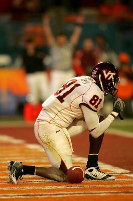 MIAMI - JANUARY 03:  Justin Harper #81 of the Virginia Tech Hokies celebrates his touchdown in the endzone against the Kansas Jayhawks during the FedEx Orange Bowl at Dolphin Stadium on January 3, 2008 in Miami, Florida.  (Photo by Matthew Stockman/Getty
