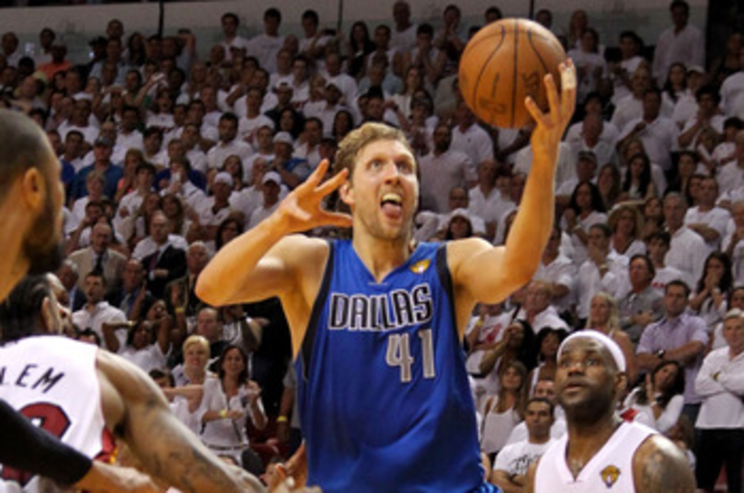 MIAMI, FL - JUNE 02:  Dirk Nowitzki #41 of the Dallas Mavericks makes the game-winning shot to put the Mavericks up 95-93 with 3.6 seconds left in the game against Udonis Haslem #40 of the Miami Heat in Game Two of the 2011 NBA Finals at American Airlines