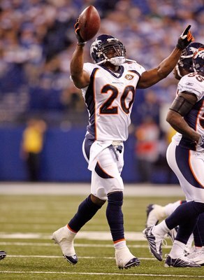 INDIANAPOLIS - DECEMBER 13:  Brian Dawkins #20 of the Denver Broncos celebrates after intercepting a pass during the NFL game against the Indianapolis Colts at Lucas Oil Stadium on December 13, 2009 in Indianapolis, Indiana.  The Colts won 28-16.  (Photo