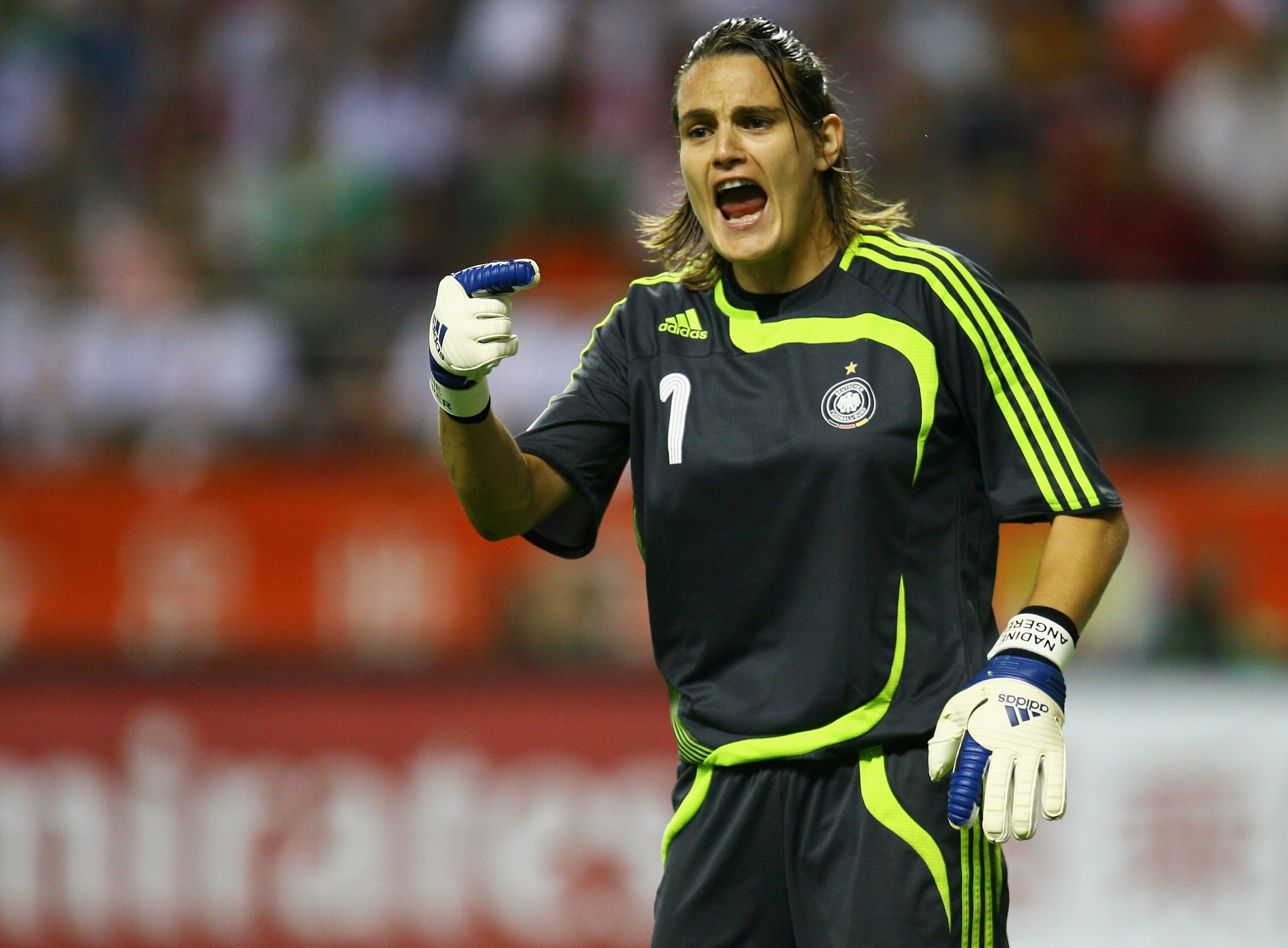 SHANGHAI, CHINA - SEPTEMBER 30:  Nadine Angerer of Germany in action during the Women's World Cup 2007 Final between Brazil and Germany at Shanghai Hongkou Football Stadium on September 30, 2007 in Shanghai, China.  (Photo by Paul Gilham/Getty Images)