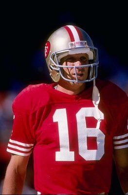 Quarterback Joe Montana of the San Francisco 49ers stands on the field during a game against the Los Angeles Rams at Candlestick Park in San Francisco, California. The Rams won the game 13-12.