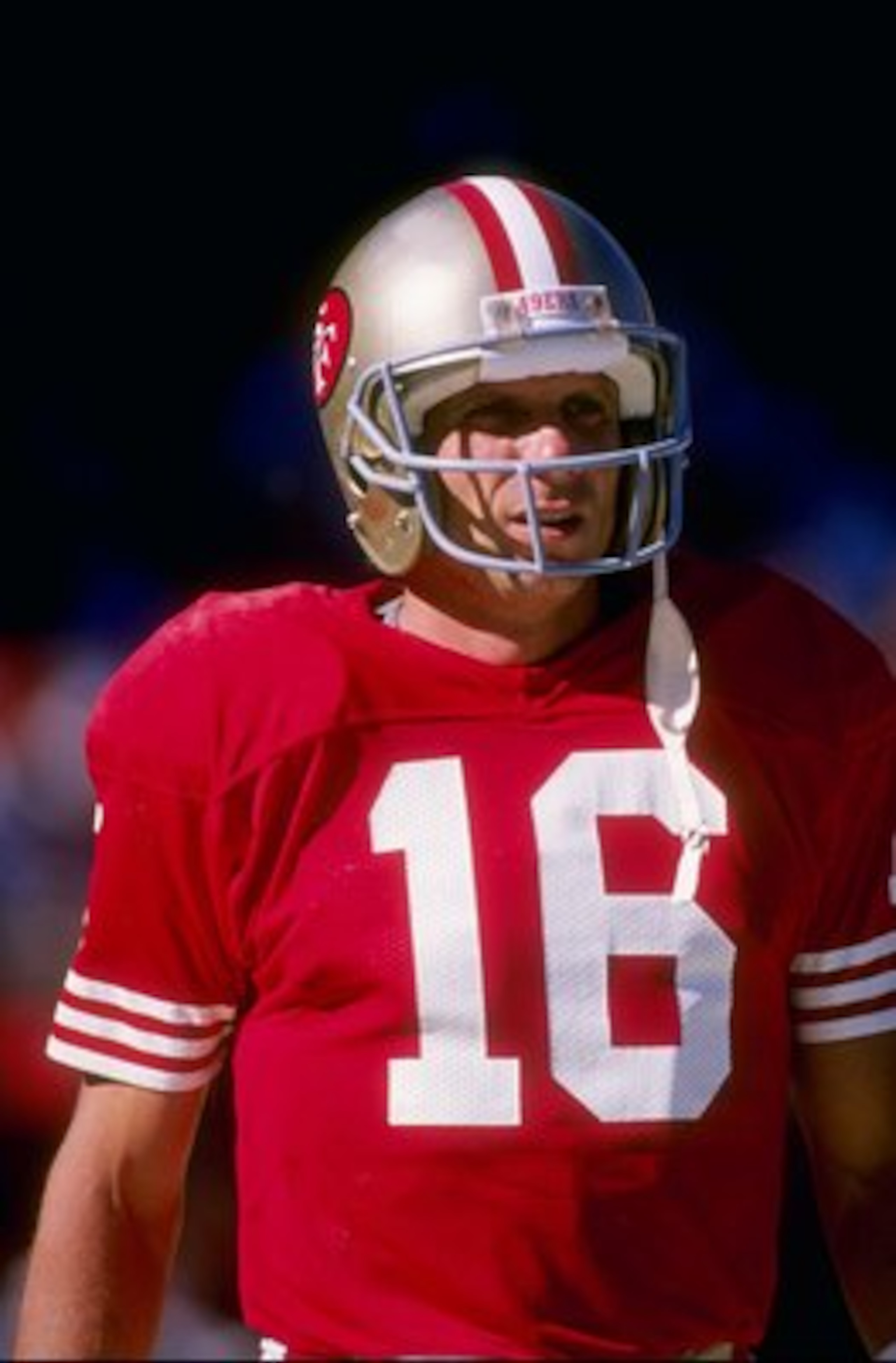 Quarterback Joe Montana of the San Francisco 49ers stands on the field during a game against the Los Angeles Rams at Candlestick Park in San Francisco, California. The Rams won the game 13-12.