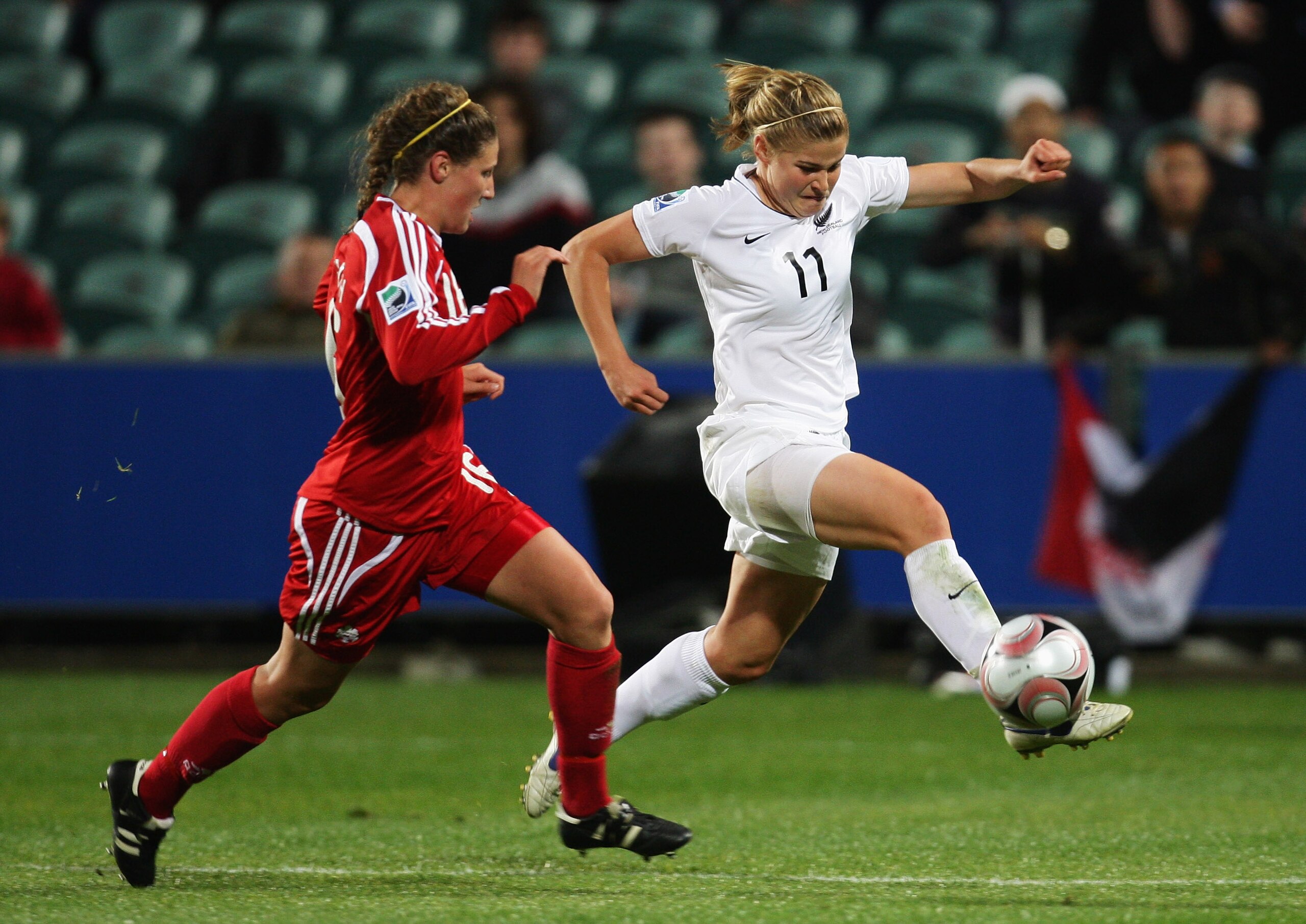 AUCKLAND, NEW ZEALAND - OCTOBER 28:  Rosie White of New Zealand (R) in action during the FIFA U-17 Women`s World Cup match between New Zealand and Canada at North Harbour Stadium on October 28, 2008 in Auckland, New Zealand.  (Photo by Sandra Mu/Getty Ima
