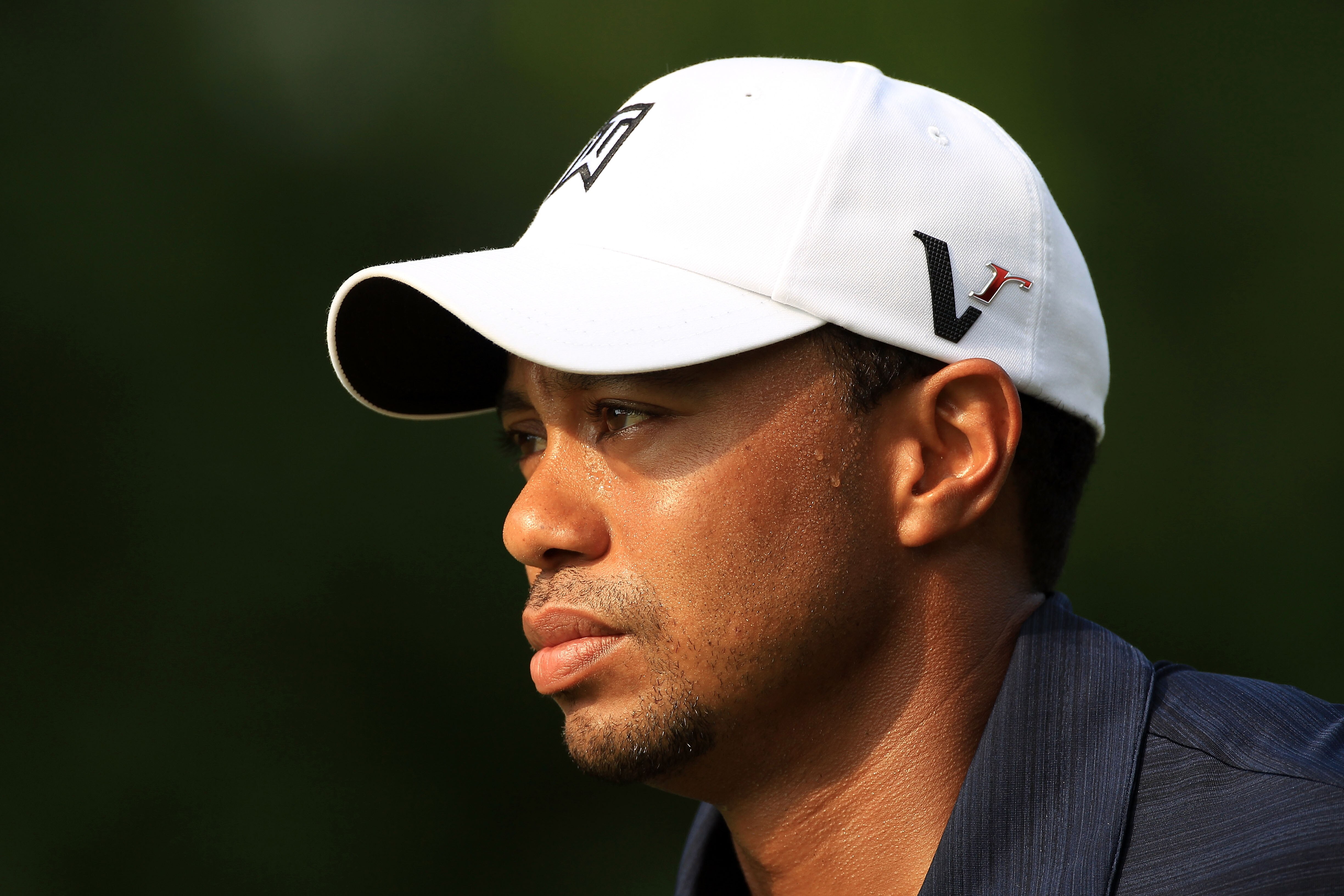 PONTE VEDRA BEACH, FL - MAY 12:  Tiger Woods looks on from the fifth hole during the first round of THE PLAYERS Championship held at THE PLAYERS Stadium course at TPC Sawgrass on May 12, 2011 in Ponte Vedra Beach, Florida.  (Photo by Streeter Lecka/Getty
