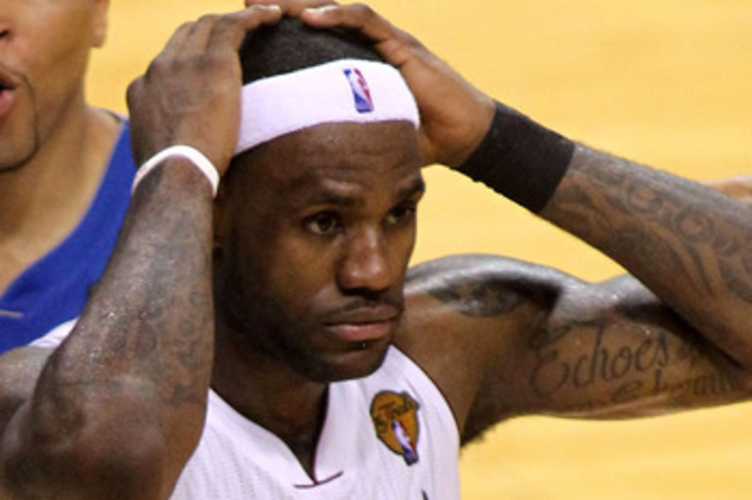 MIAMI, FL - JUNE 02:  LeBron James #6 of the Miami Heat reacts as Shawn Marion #0 of the Dallas Mavericks looks on in Game Two of the 2011 NBA Finals at American Airlines Arena on June 2, 2011 in Miami, Florida. The Mavericks won 95-93. NOTE TO USER: User