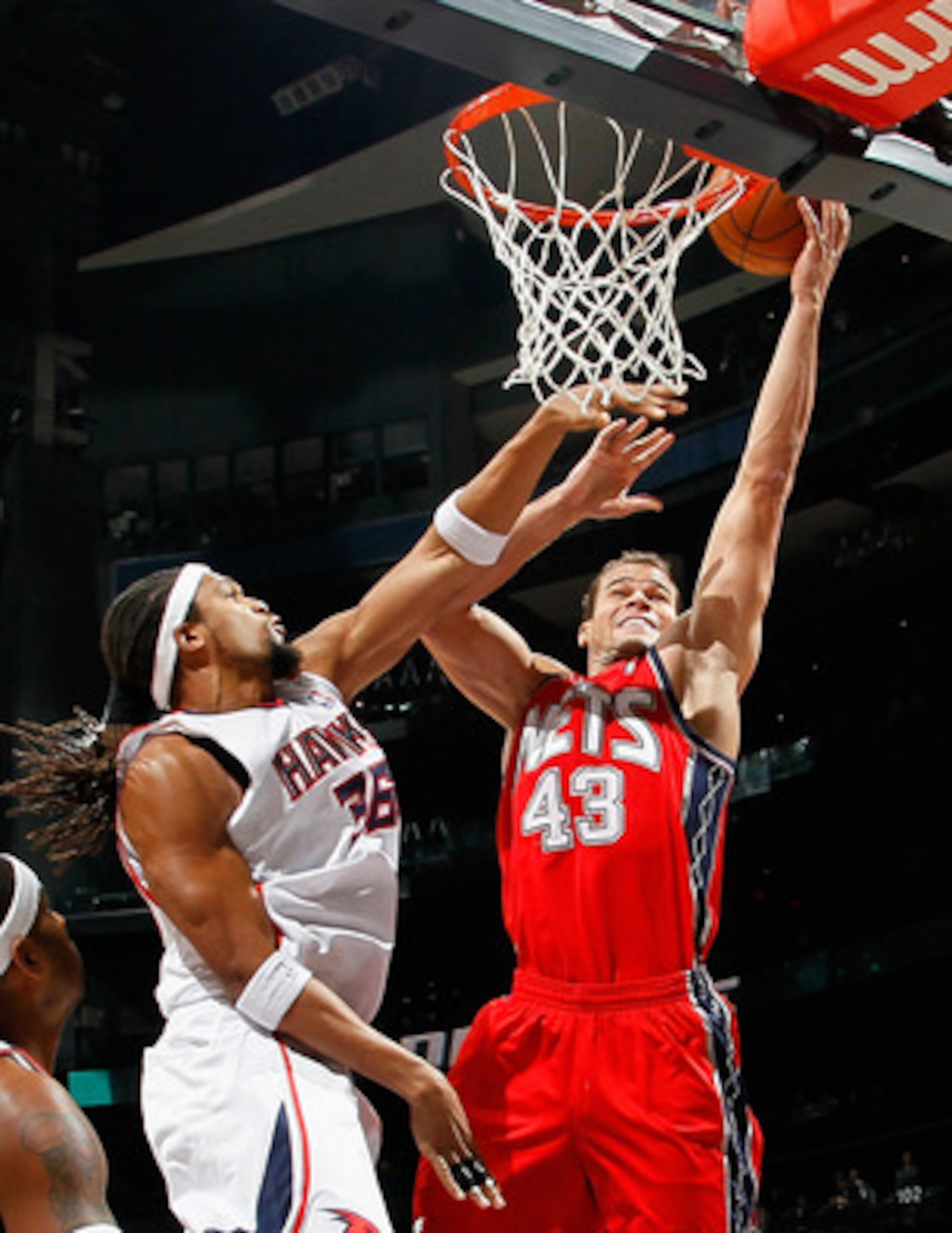 ATLANTA, GA - DECEMBER 07: Etan Thomas #36 of the Atlanta Hawks defends the basket against Kris Humphries #43 of the New Jersey Nets at Philips Arena on December 7, 2010 in Atlanta, Georgia. NOTE TO USER: User expressly acknowledges and agrees that, by ATLANTA, GA - DECEMBER 07: Etan Thomas #36 of the Atlanta Hawks defends the basket against Kris Humphries #43 of the New Jersey Nets at Philips Arena on December 7, 2010 in Atlanta, Georgia. NOTE TO USER: User expressly acknowledges and agrees that, by