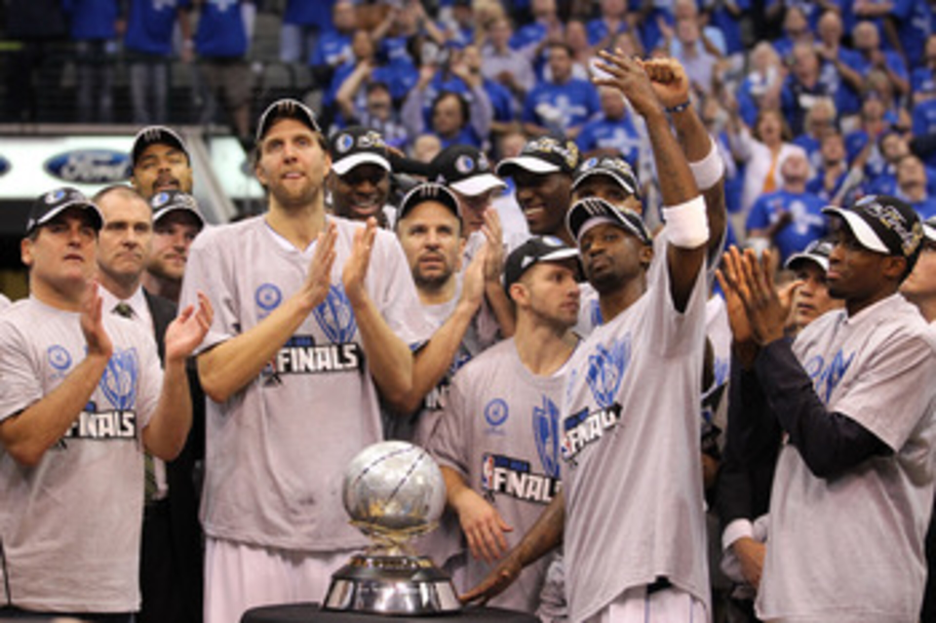DALLAS, TX - MAY 25:  The Dallas Mavericks celebrate their 100-96 victory against the Oklahoma City Thunder in Game Five of the Western Conference Finals during the 2011 NBA Playoffs at American Airlines Center on May 25, 2011 in Dallas, Texas. NOTE TO US