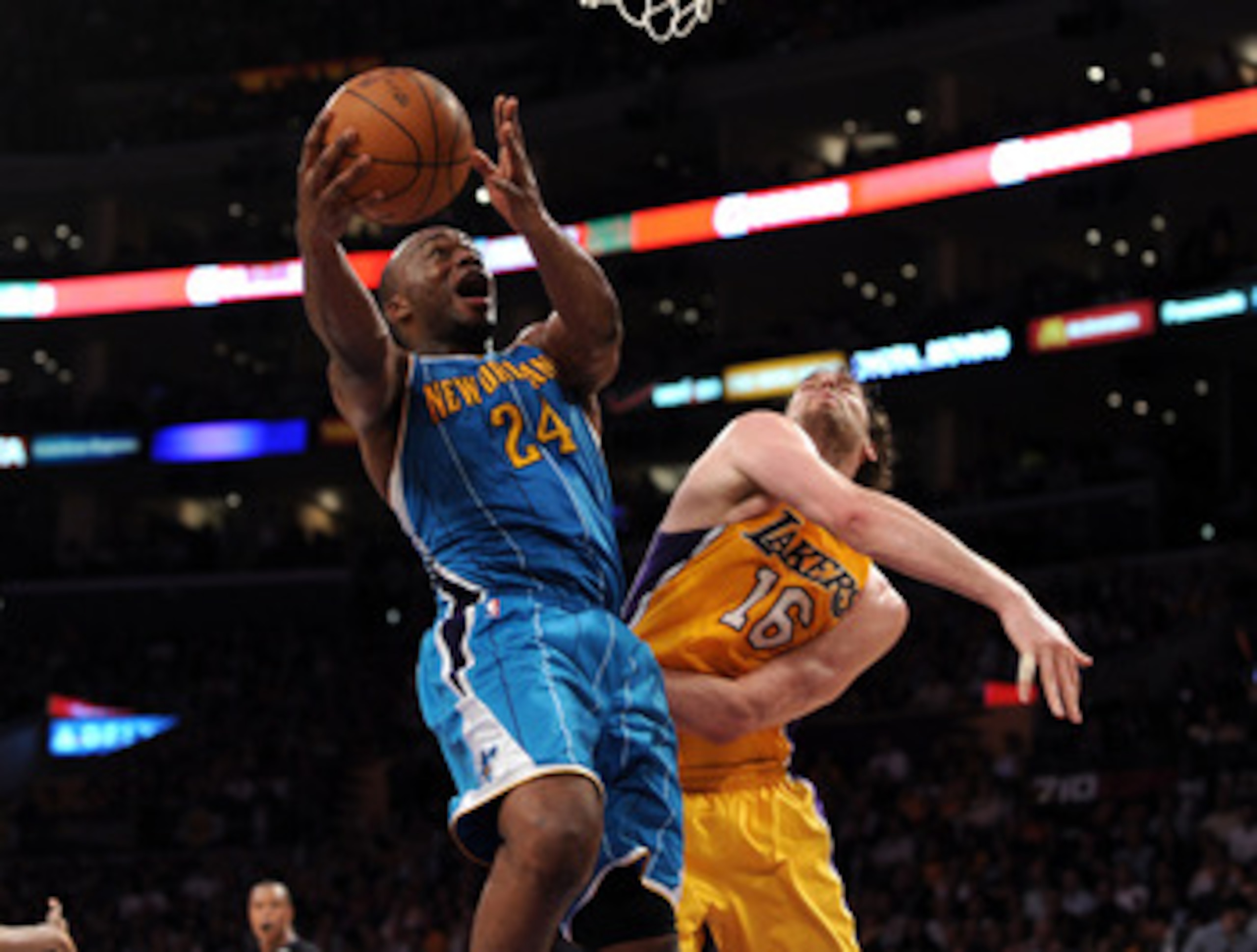 LOS ANGELES, CA - APRIL 26: Carl Landry #24 of the New Orleans Hornets goes up for a shot against Pau Gasol #16 of the Los Angeles Lakers in the third quarter in Game Five of the Western Conference Quarterfinals in the 2011 NBA Playoffs on April 26, 2011 LOS ANGELES, CA - APRIL 26: Carl Landry #24 of the New Orleans Hornets goes up for a shot against Pau Gasol #16 of the Los Angeles Lakers in the third quarter in Game Five of the Western Conference Quarterfinals in the 2011 NBA Playoffs on April 26, 2011