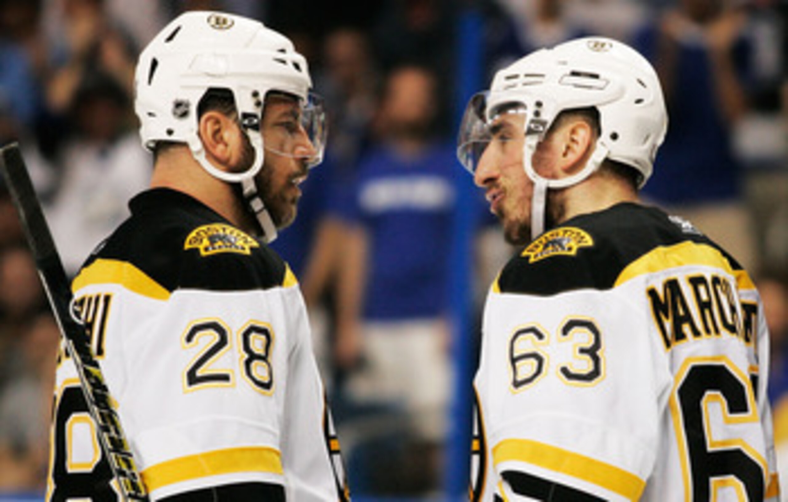 TAMPA, FL - MAY 21:  Mark Recchi #28 talks to Brad Marchand #63 of the Boston Bruins in Game Four of the Eastern Conference Finals against the Tampa Bay Lightning during the 2011 NHL Stanley Cup Playoffs at St Pete Times Forum on May 21, 2011 in Tampa, Fl