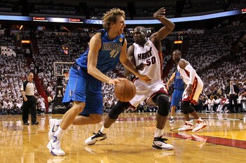 MIAMI, FL - MAY 31:  Dirk Nowitzki #41 of the Dallas Mavericks drives against Joel Anthony #50 of the Miami Heat in Game One of the 2011 NBA Finals at American Airlines Arena on May 31, 2011 in Miami, Florida. NOTE TO USER: User expressly acknowledges and
