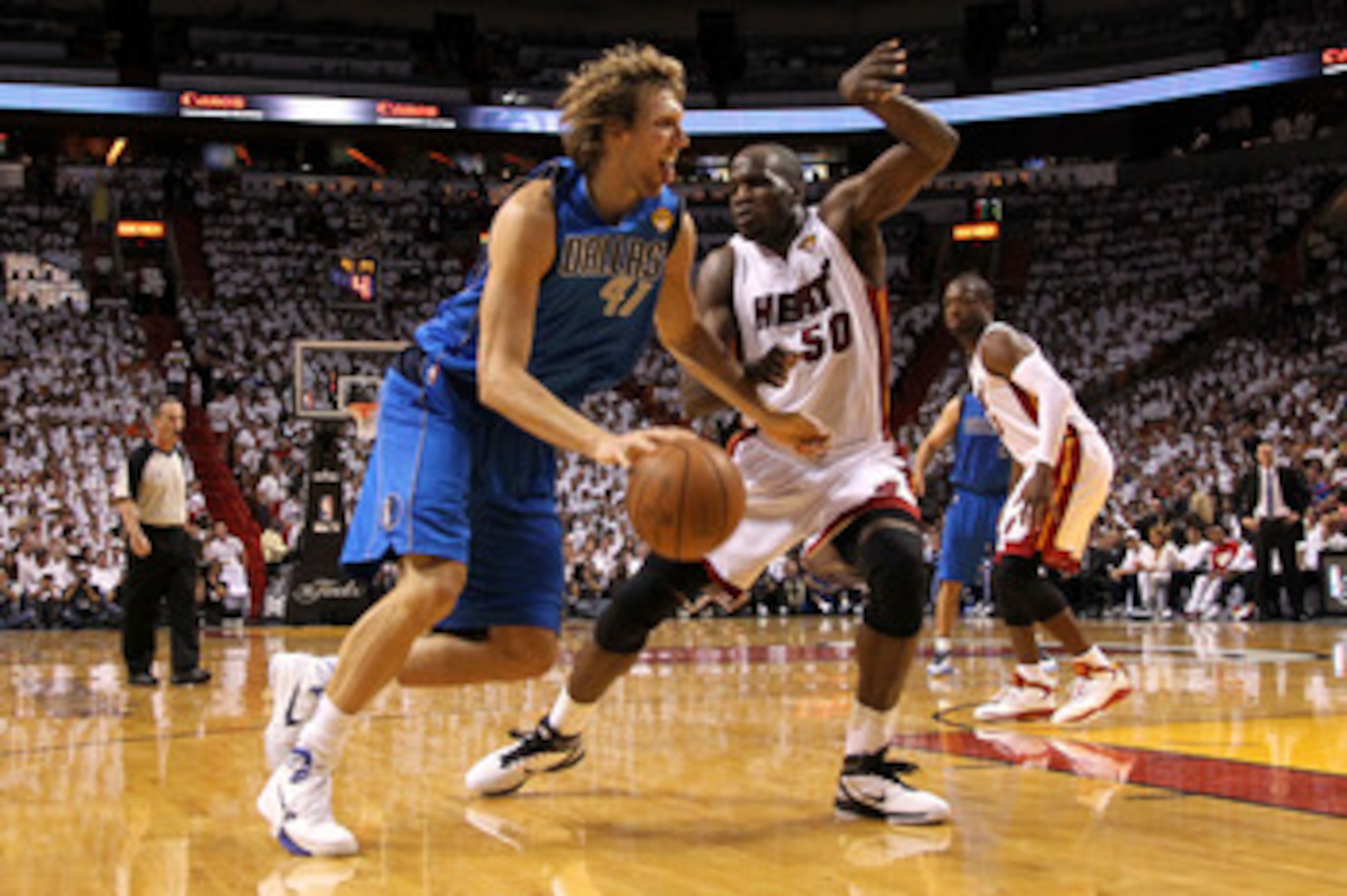 MIAMI, FL - MAY 31:  Dirk Nowitzki #41 of the Dallas Mavericks drives against Joel Anthony #50 of the Miami Heat in Game One of the 2011 NBA Finals at American Airlines Arena on May 31, 2011 in Miami, Florida. NOTE TO USER: User expressly acknowledges and