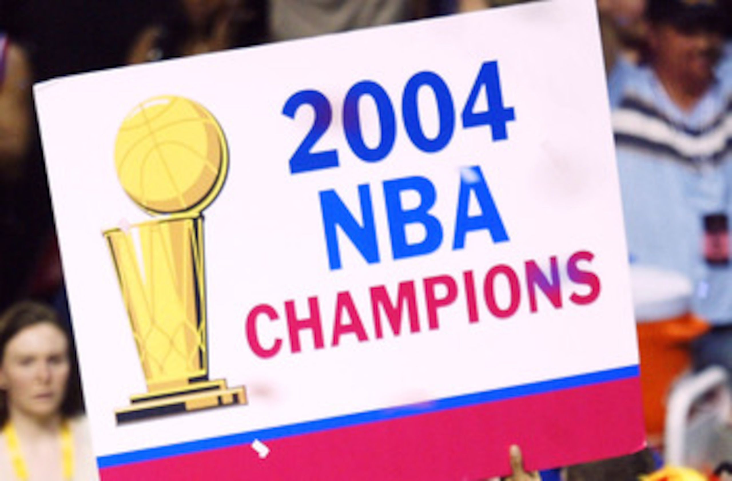 AUBURN HILLS, MI - JUNE 15:  Rasheed Wallace #30 of the Detroit Pistons celebrates with a sign after defeating the Los Angeles Lakers 100-87 in game five of the 2004 NBA Finals on June 15, 2004 at The Palace of Auburn Hills in Auburn Hills, Michigan.  NOT